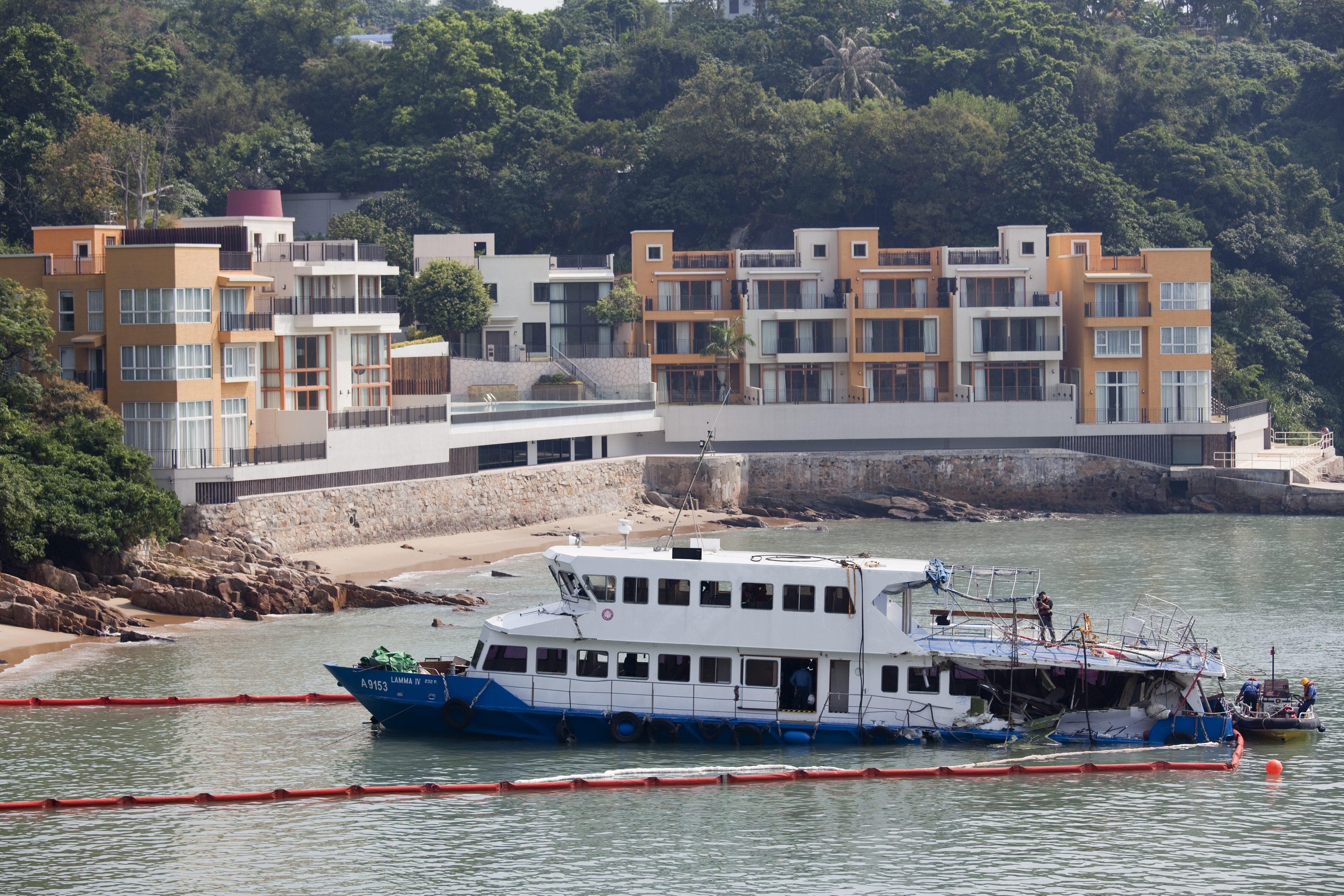 The damaged Lamma IV is moored off Lamma Island in Hong Kong after the  October 2012 collision that killed 38 people. Photo: EPA