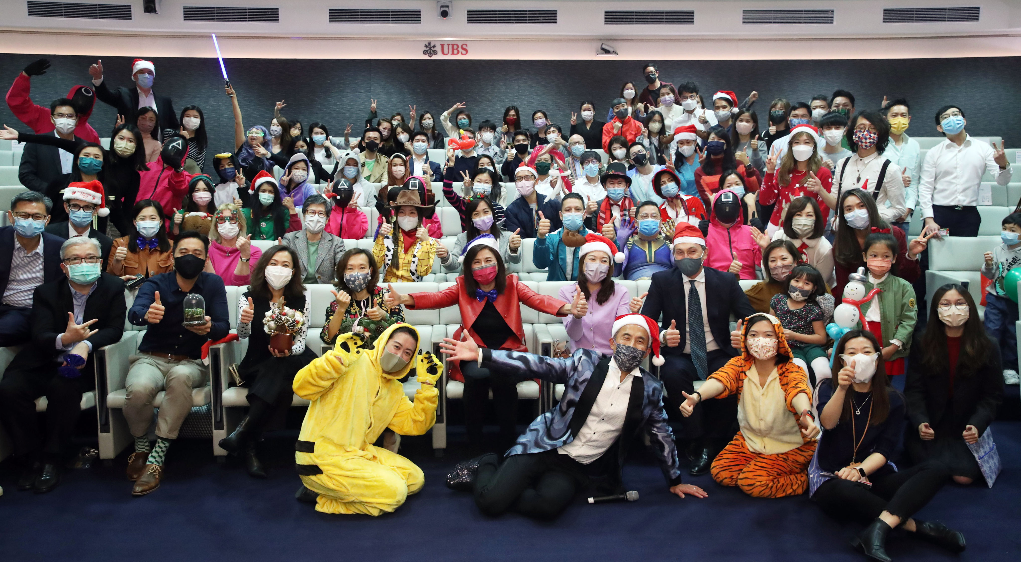 UBS staff raised some HK$1.6 million for Operation Santa Claus at their annual Christmas Party. Photo: Edmond So