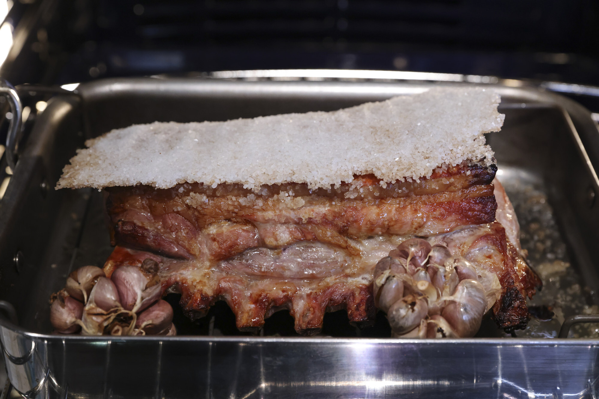 Pork Rack Cooked How to make five-spice roasted pork rack with crispy crackling and meat ...