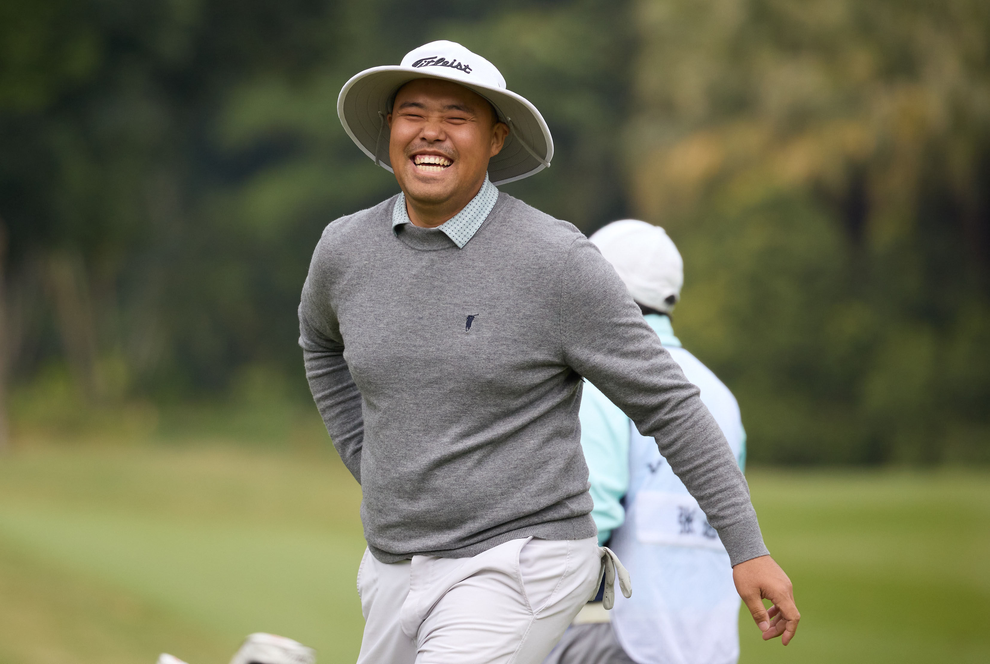 Zhang Jin is all smiles as he plays the final round of the Volvo China Open at Genzon Golf Club in Shenzhen. Photo: Handout