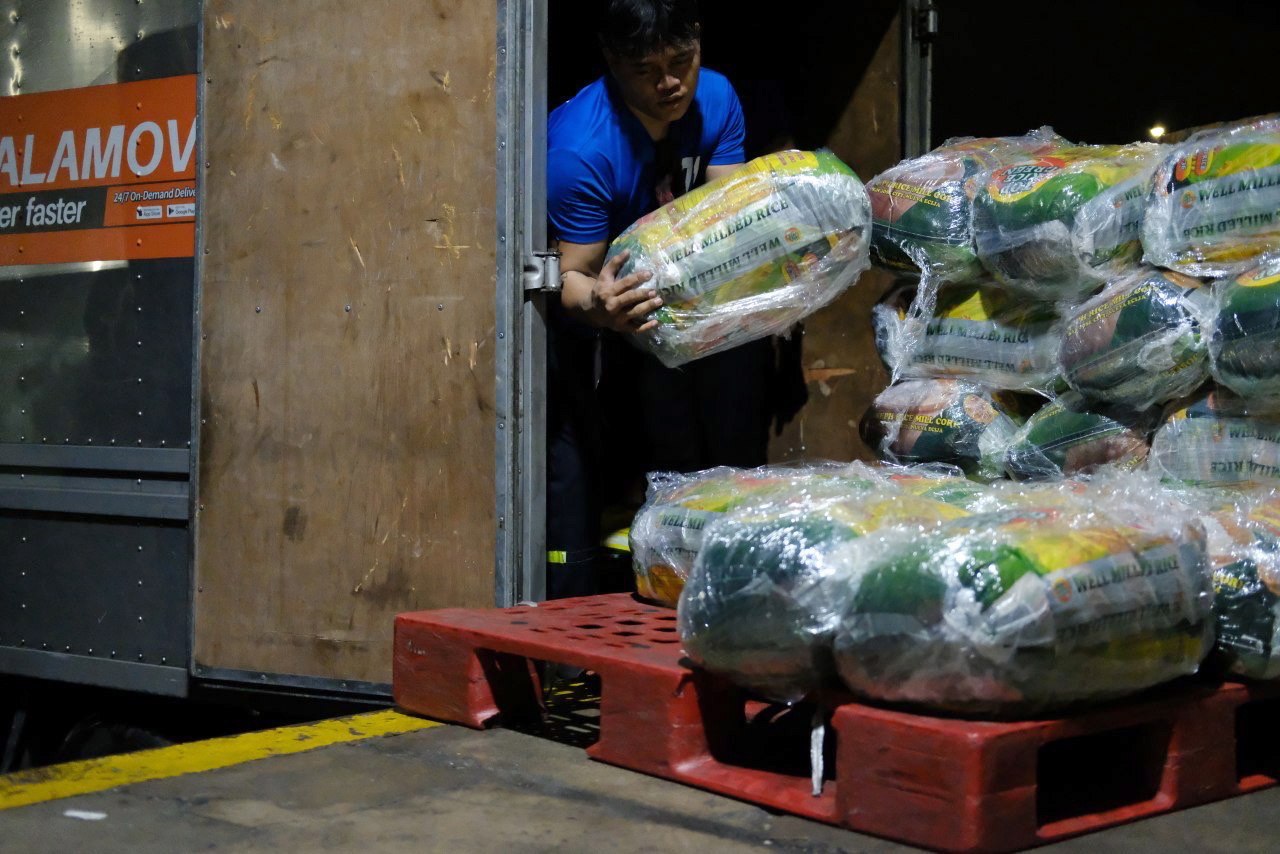 A worker unloads relief goods in Cebu, in the Philippines, on December 19. While there is a clear imperative for providing emergency relief funds, long-term foreign aid projects often fail to meet their aims because of short-sighted planning. Photo: EPA-EFE