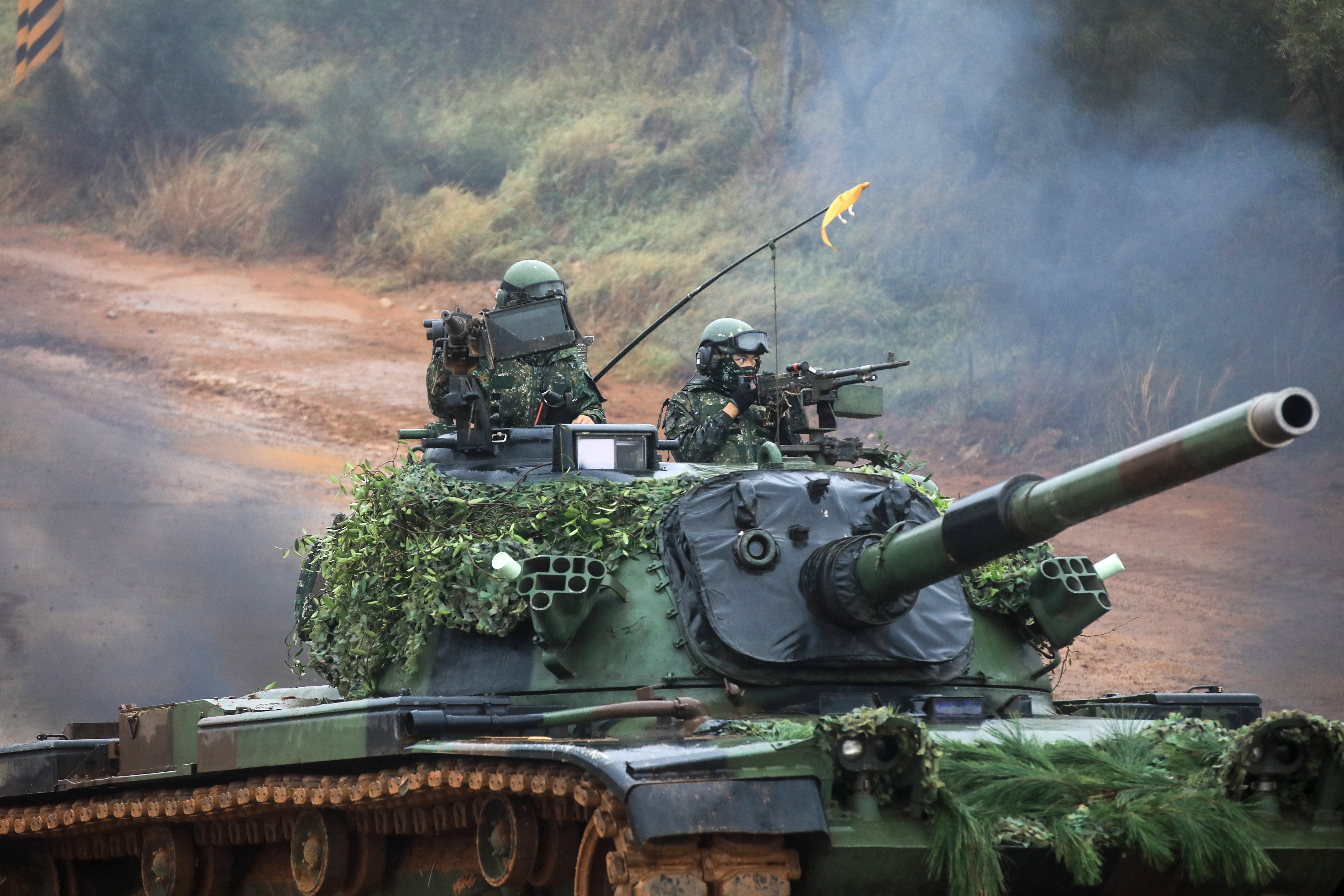 Taiwan Armed Forces soldiers crew a CM-11 Brave Tiger battle tank during a military combat live-fire exercise in Hsinchu, Taiwan, on December 21. Taiwan has always been viewed as unfinished business and an issue of great importance for Beijing. Photo: Bloomberg