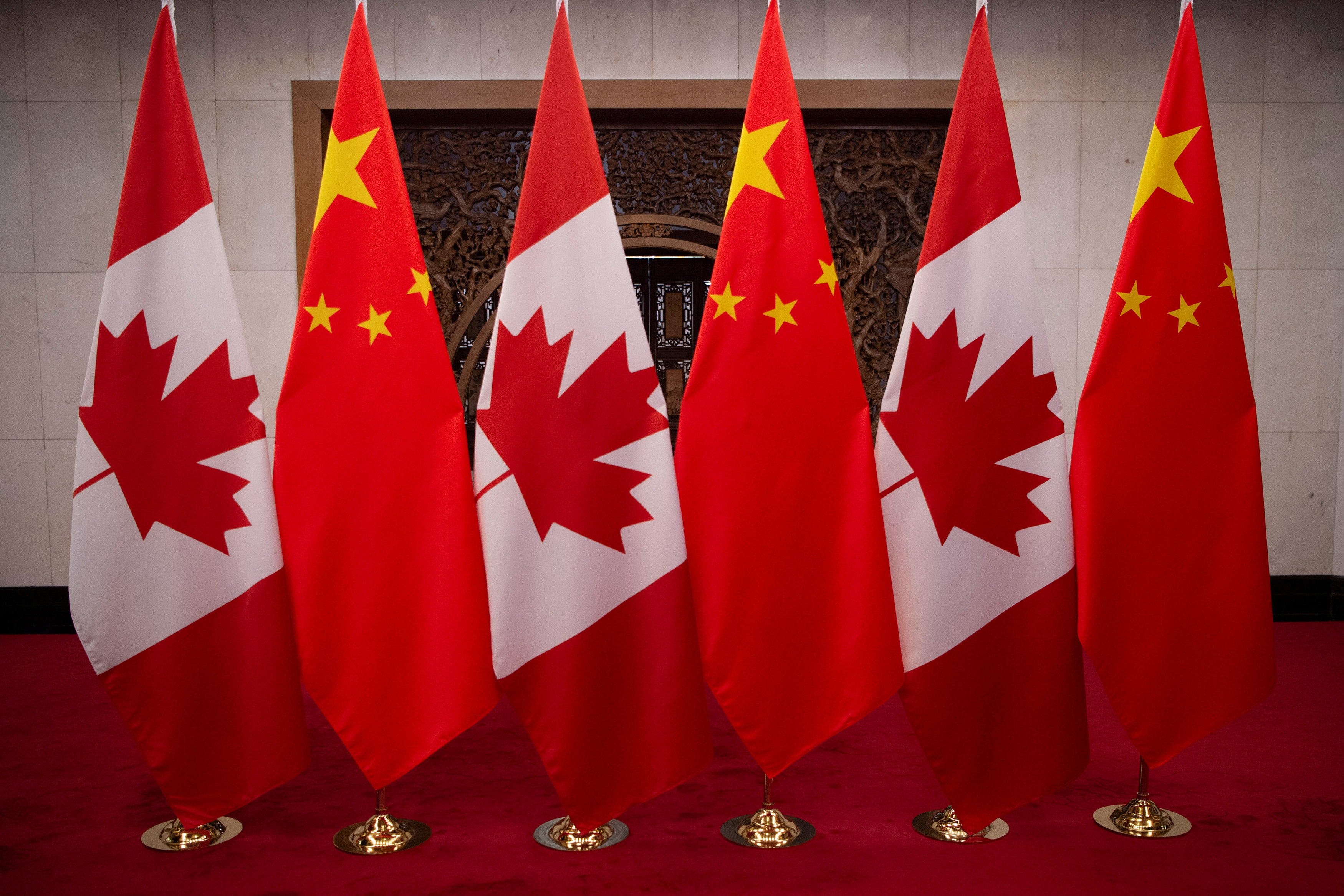 Canadian and Chinese flags are arranged at the Diaoyutai State Guesthouse in Beijing on December 5, 2017, prior to a meeting between Canada’s Prime Minister Justin Trudeau and China’s President Xi Jinping. Photo: Reuters