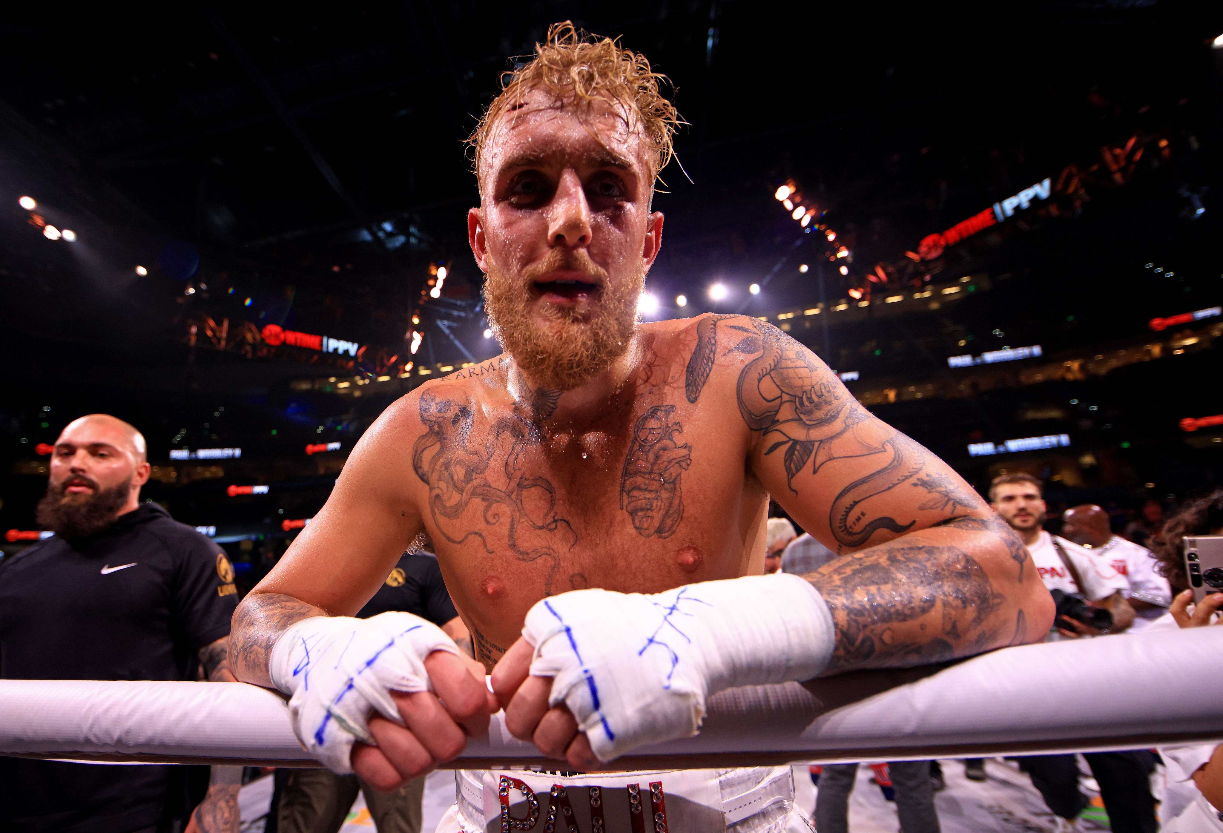 Jake Paul reacts to knocking out Tyron Woddley in the sixth round of their rematch. Photo: Mike Ehrmann/Getty Images/AFP