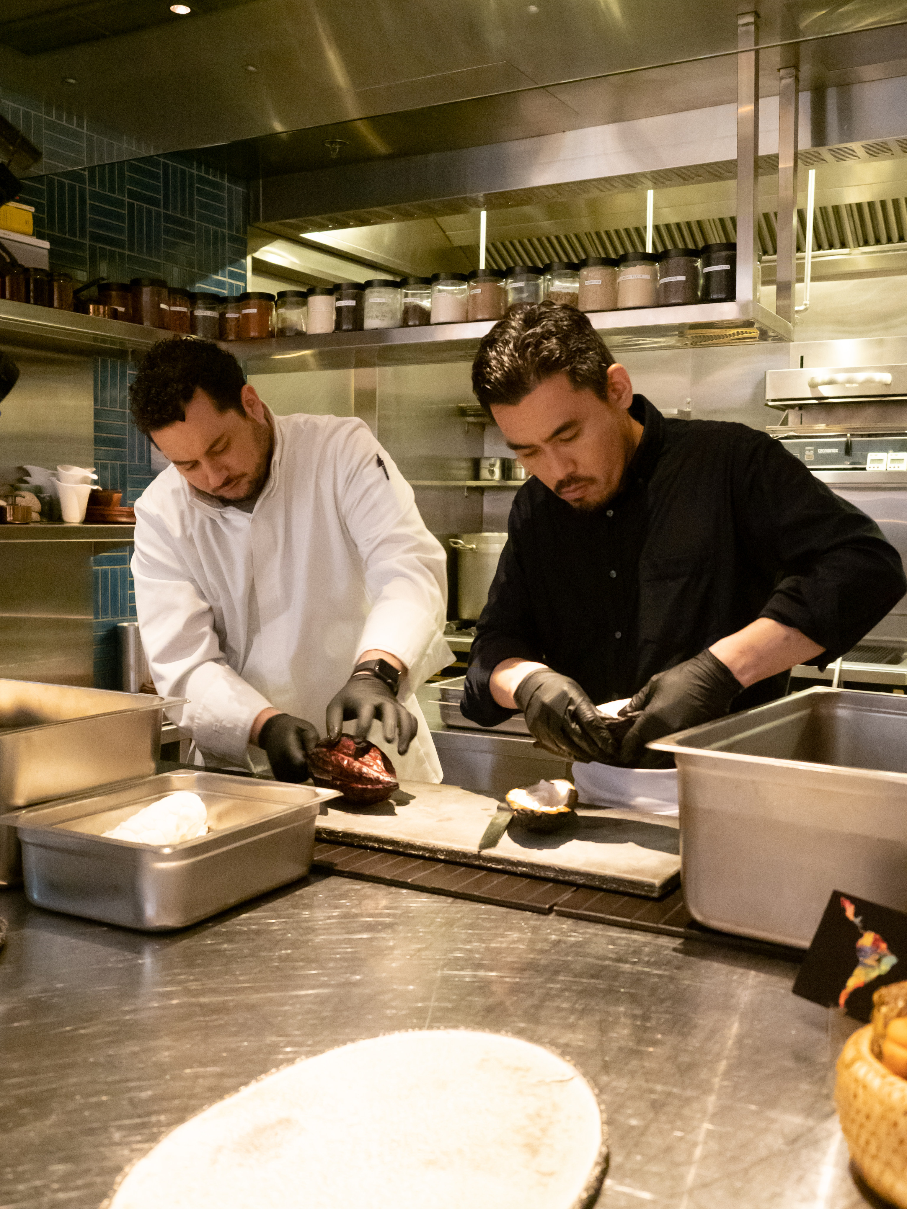 Chefs Ricardo Chaneton and Hideaki Sato making their own chocolate from scratch. Photo: Discovery