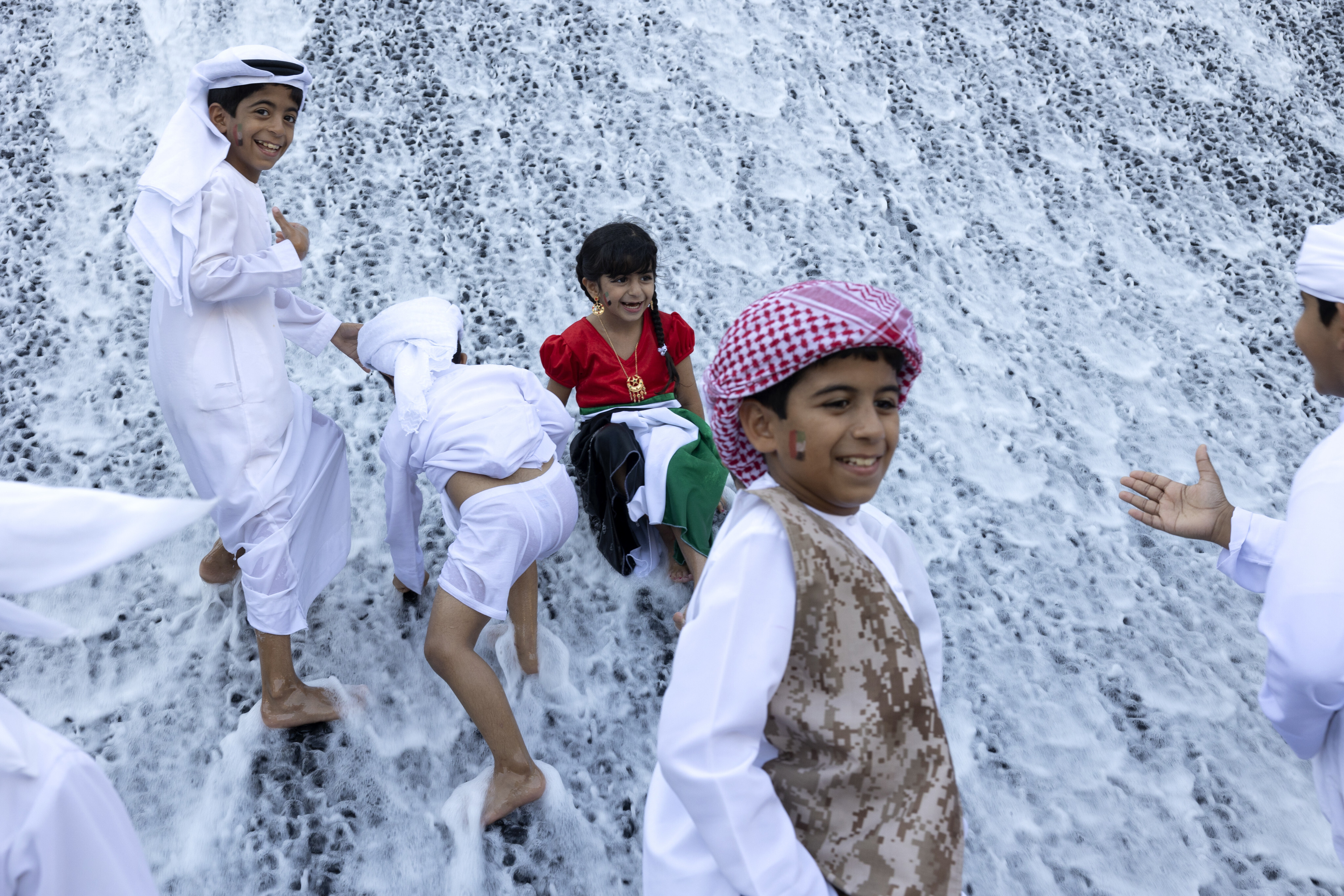 Children play at the Expo 2020 Water Feature during the Expo 2020 Dubai in the United Arab Emirates. Photo: Palani Mohan/Expo 2020 Dubai