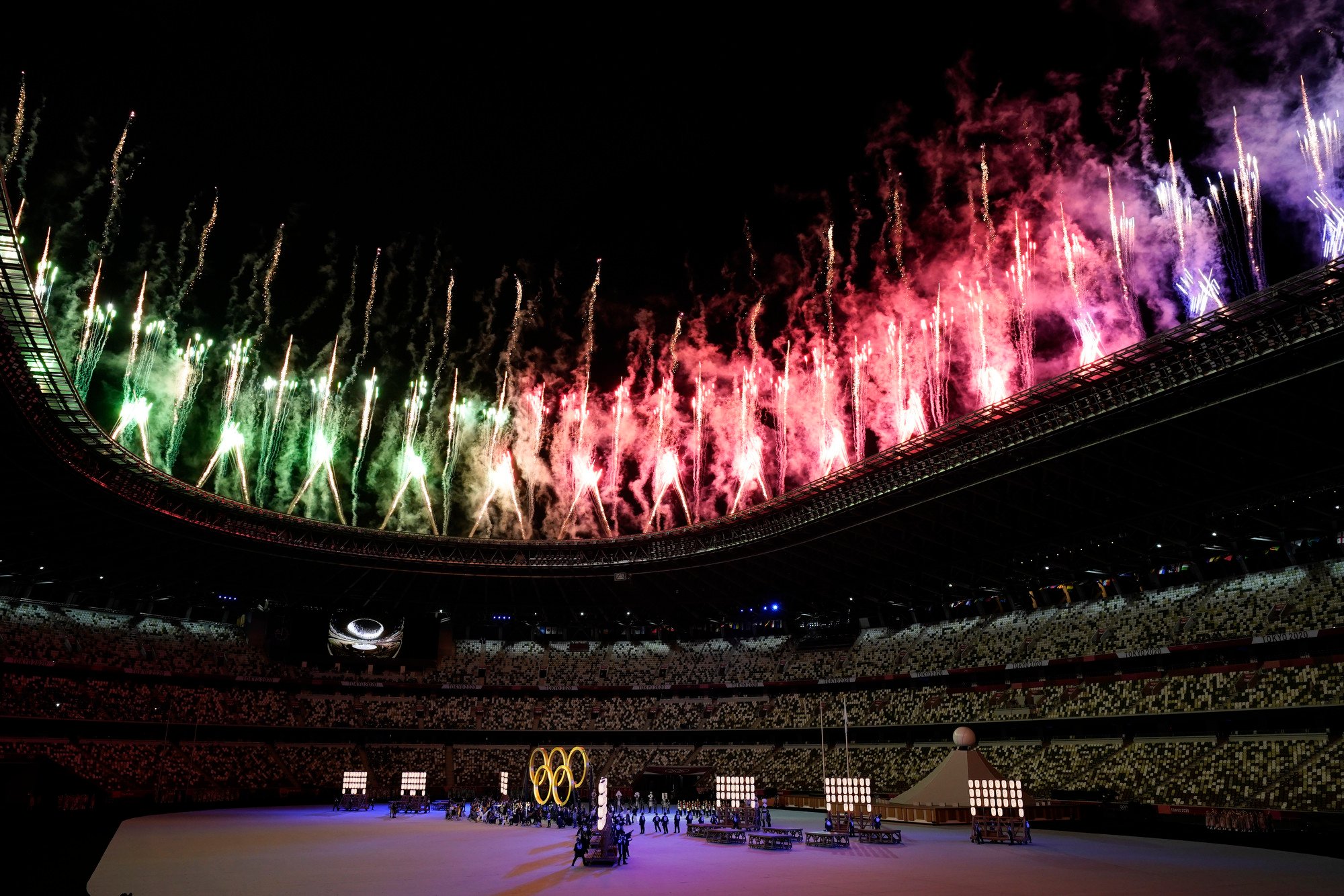 Fireworks are seen during the opening ceremony of the 2020 Summer Olympics in Tokyo, on July 23. Despite concerns over budgets and Covid-19, the delayed Olympics provided a much needed distraction from the pandemic. Photo: AP 