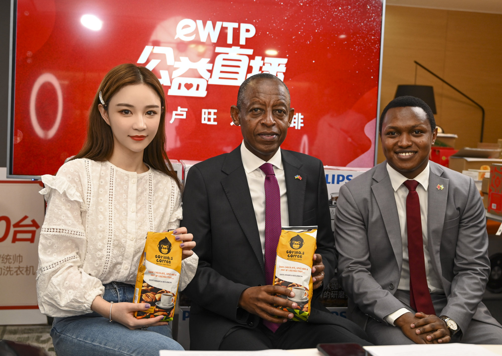 James Kimonyo, Rwanda’s ambassador to China (centre), promotes coffee during a live stream with Chinese influencer Cherie and the embassy’s commercial attaché, Sam Abikunda (right). Photo: Handout 