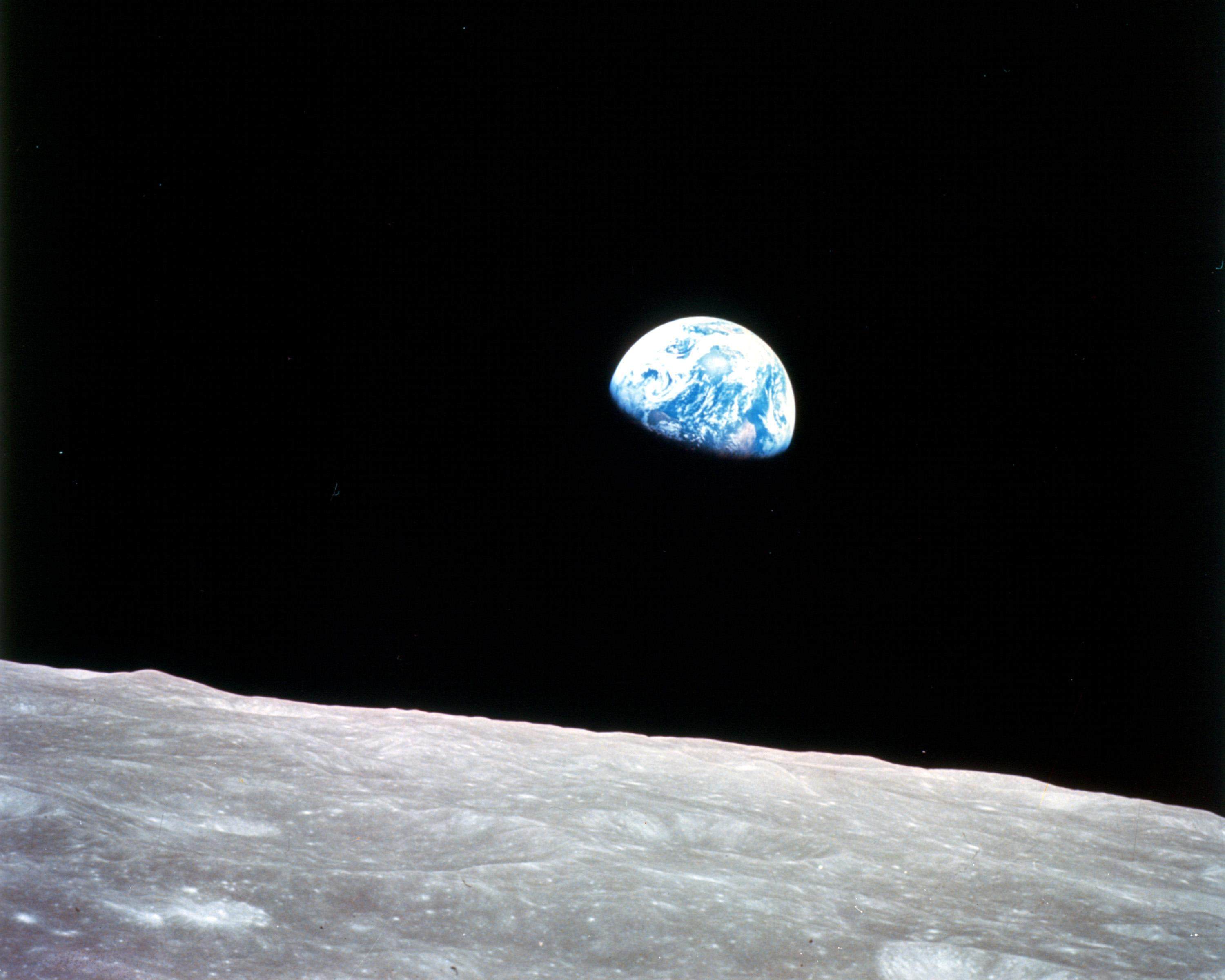 Earthrise over the moon. China aims to set up a lunar research base sooner than planned. Photo: AFP/Nasa
