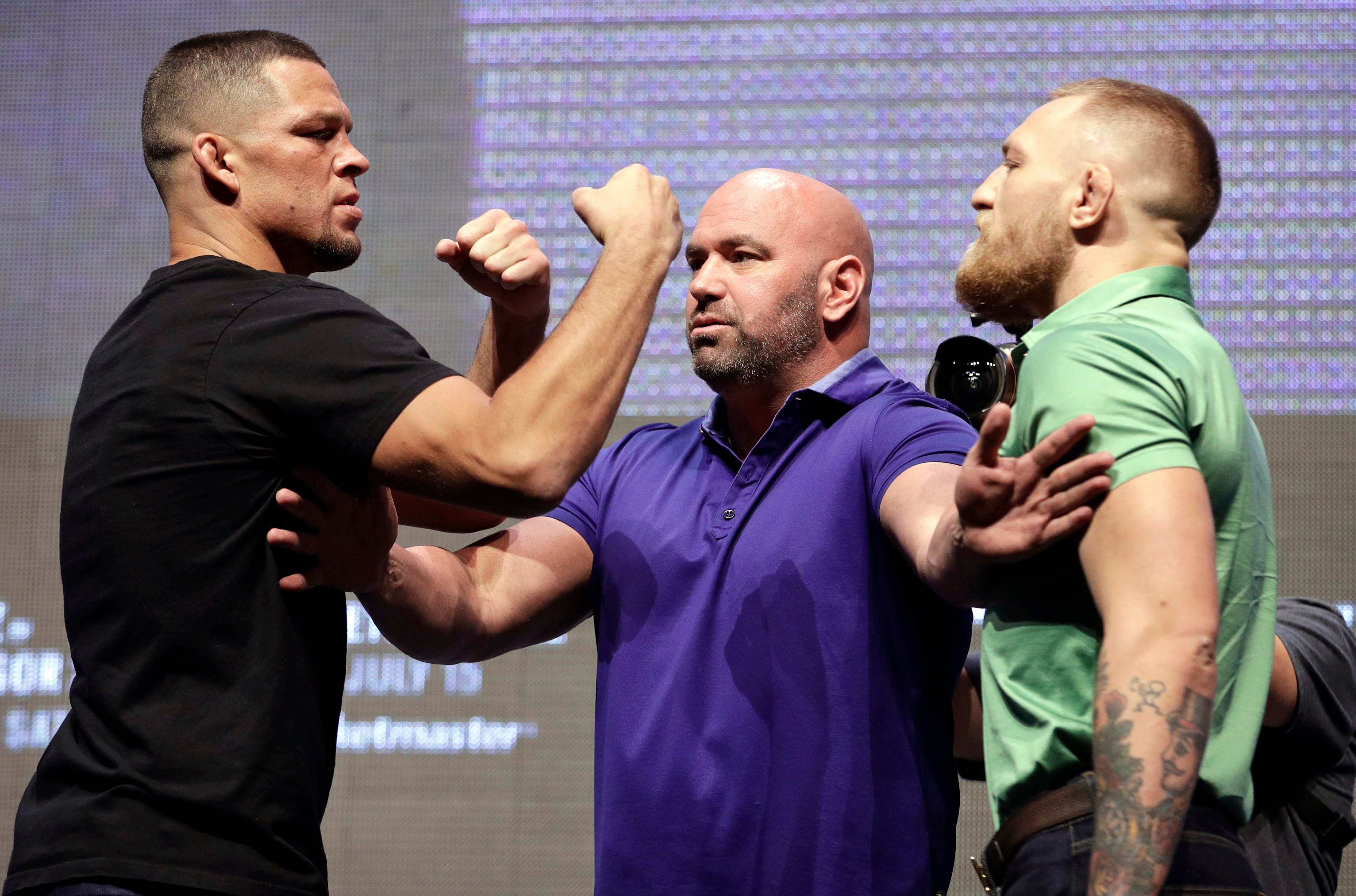 Nate Diaz (left) and Conor McGregor square off before their fight at UFC 196 in 2016. Photo: AP Photo/John Locher, File