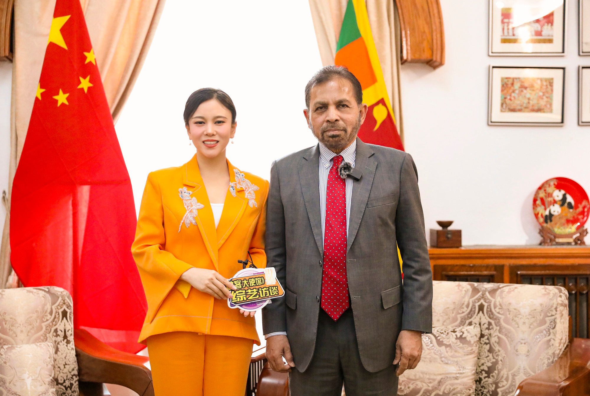 Ambassador of Sri Lanka to China, Palitha Kohona (right), posing next to Chinese presenter Zora Liu Meixi at the Sri Lankan embassy in Beijing. Photo: Handout