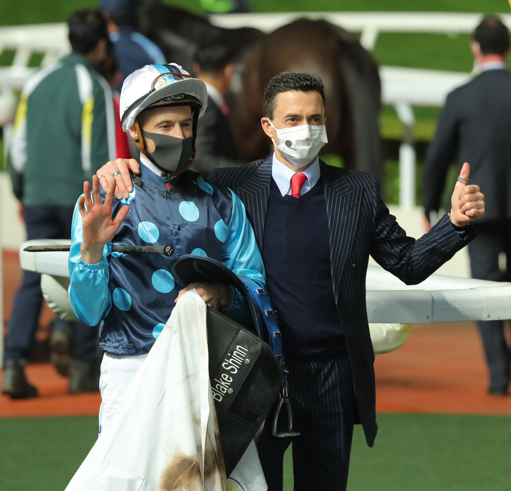 Jockey Blake Shinn and trainer Douglas Whyte celebrate Will Power’s victory.