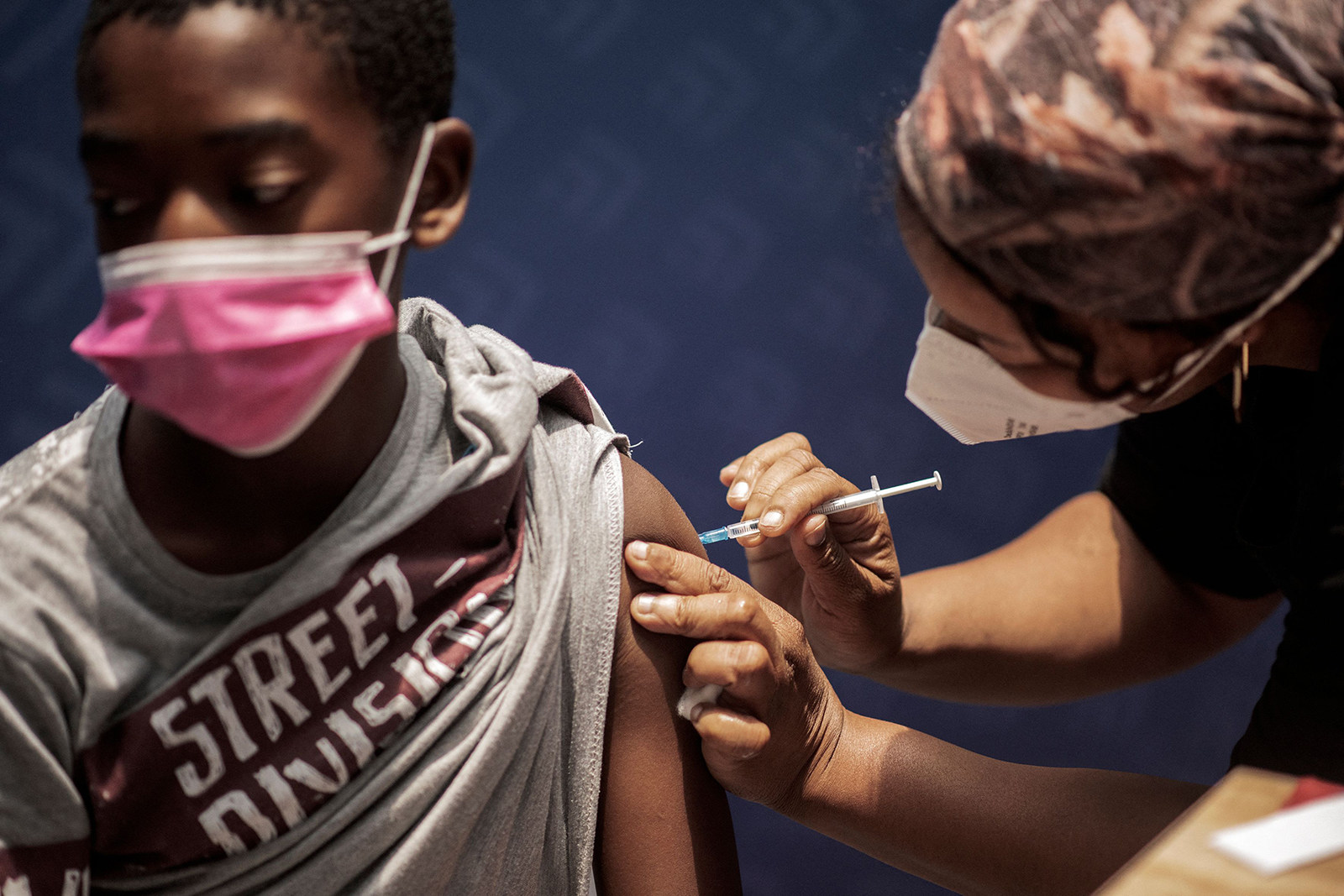 A boy receives a dose of the Pfizer-BioNTech vaccine at the Discovery vaccination site in Sandton, Johannesburg, on December 15. Photo: TNS
