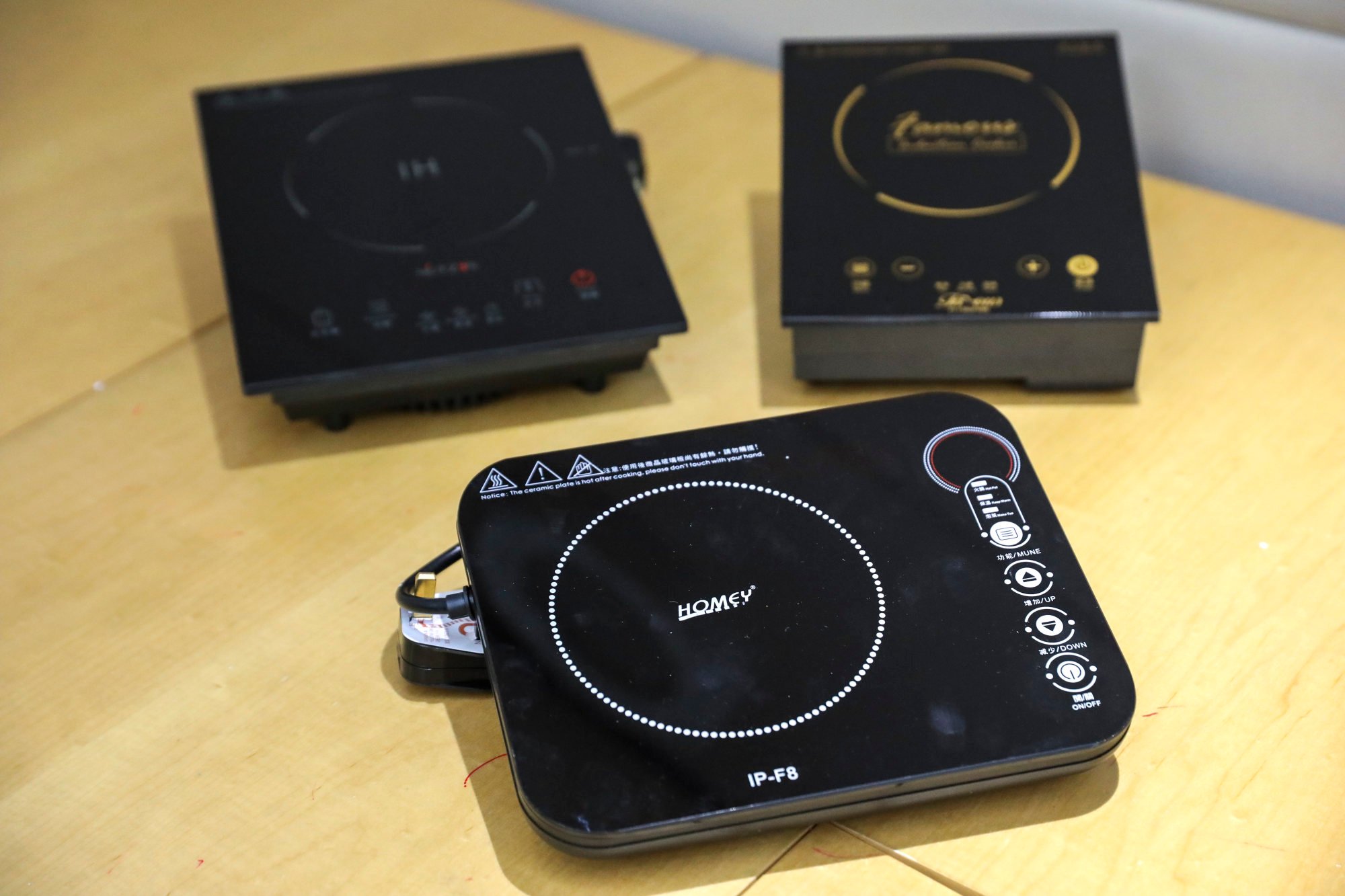 Electric hobs often feature touch-sensitive buttons that can be inadvertently pressed by curious cats that are left home alone. Photo: Nora Tam