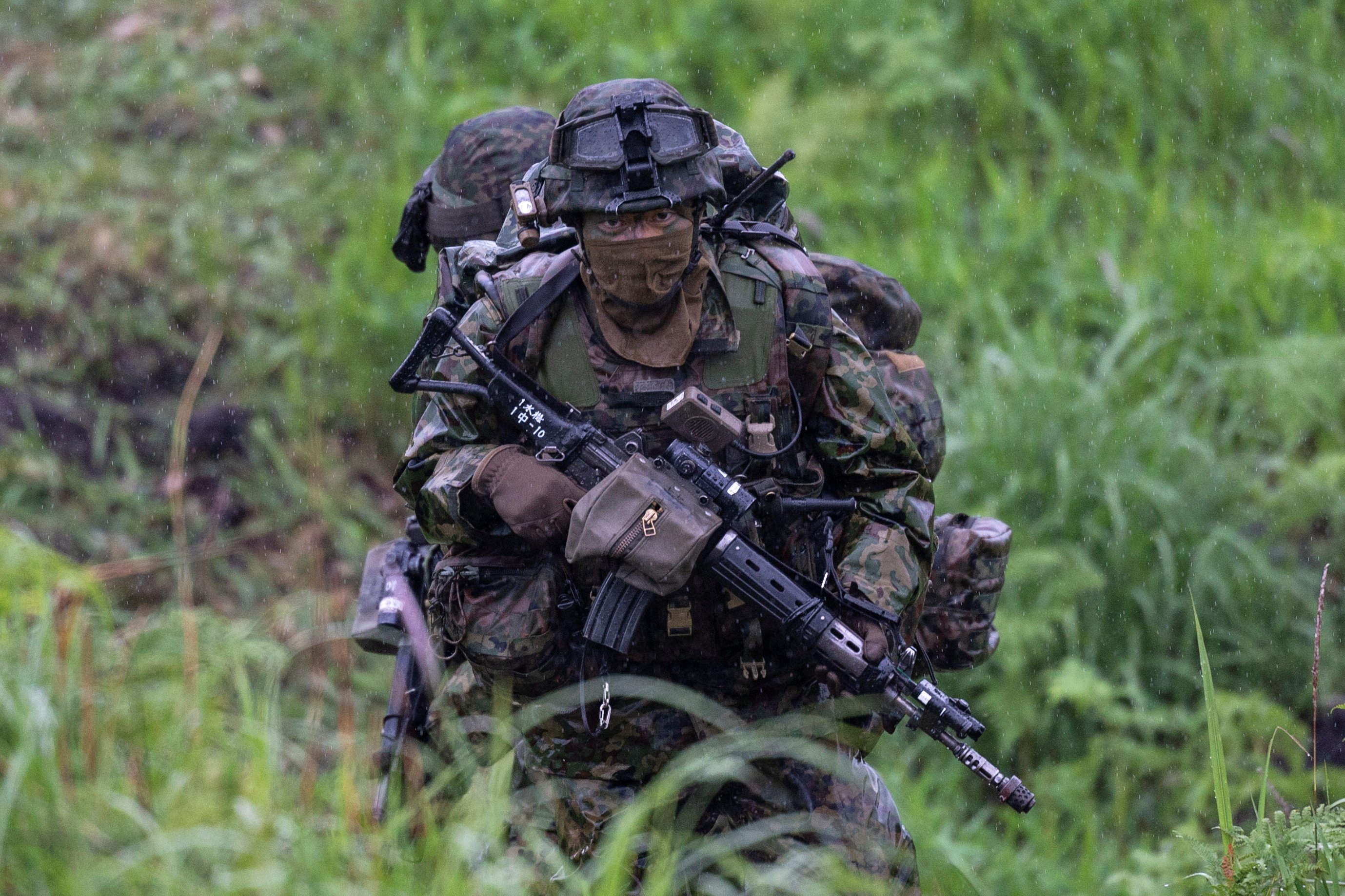 A Japanese soldier trains during a joint military drill with French and US forces in May. Photo: Reuters