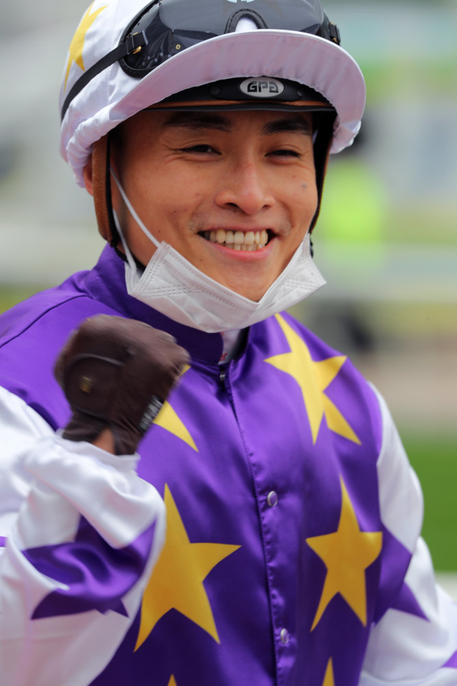 Jockey Keith Yeung celebrates a recent winner.
