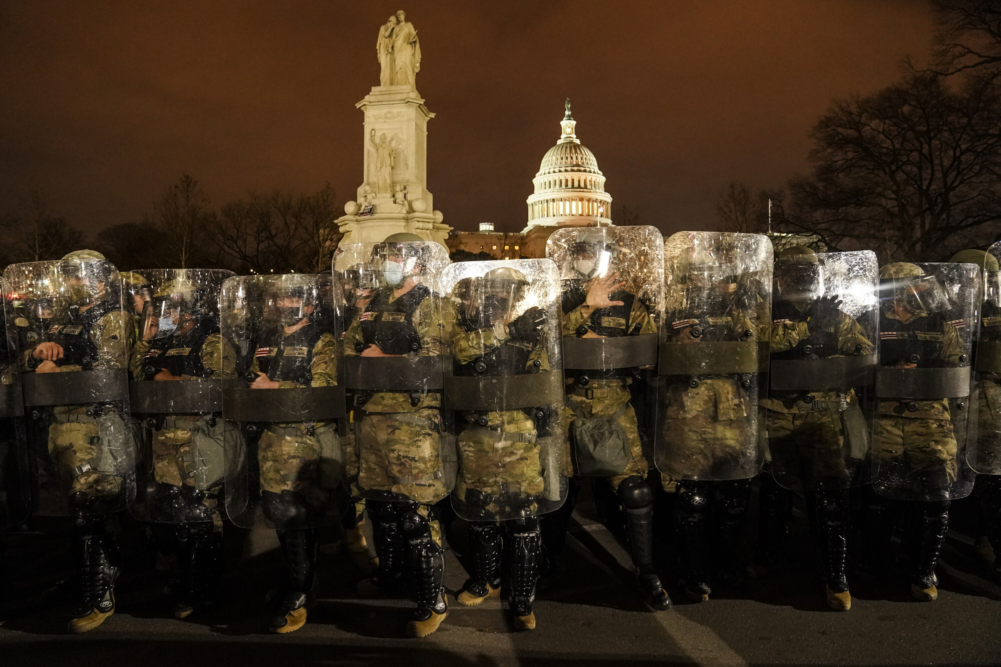 District of Columbia National Guard stand outside the US Capitol on January 6, 2021, after a day of rioting by Trump supporters. Photo: AP