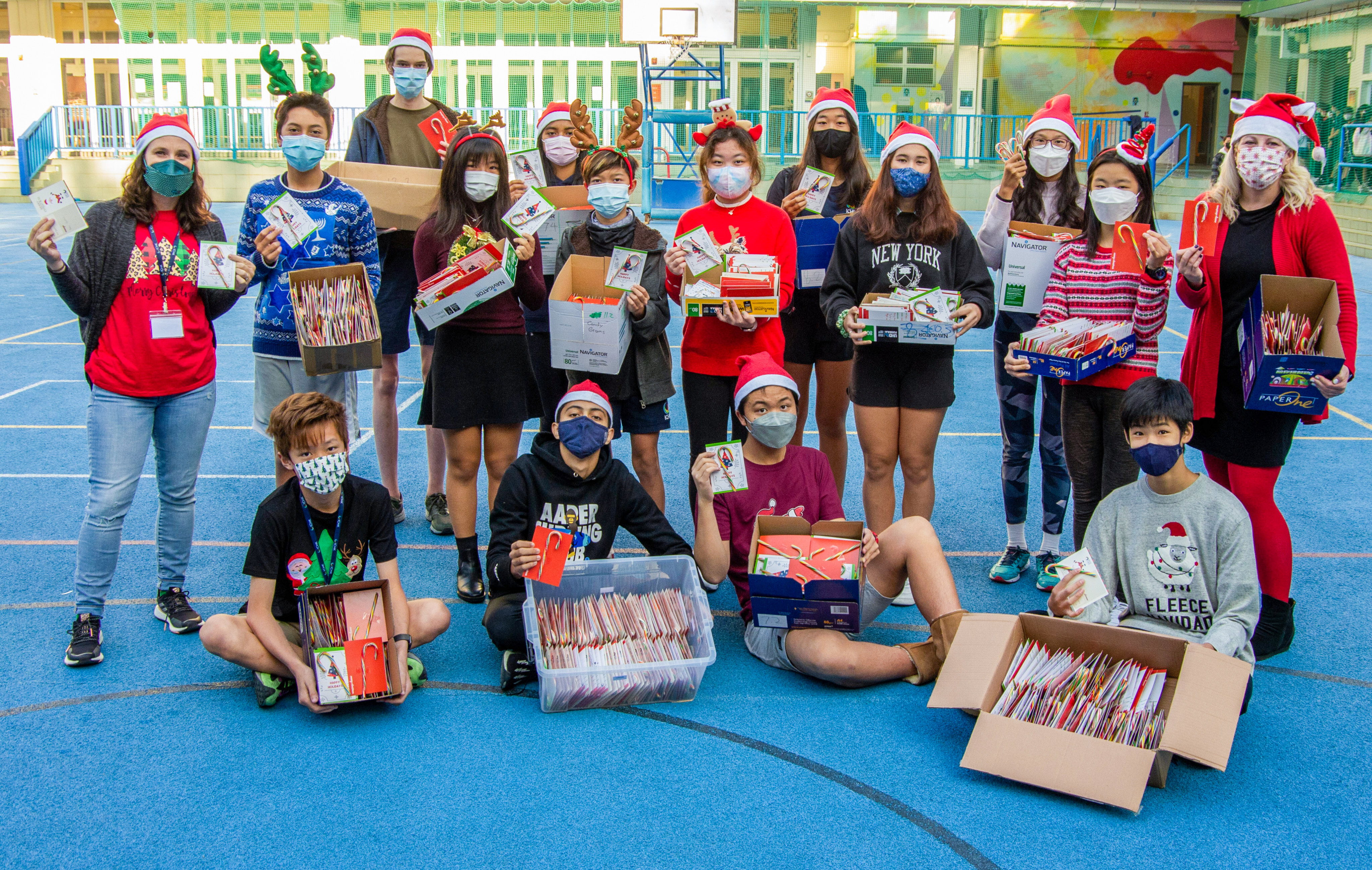 The Student Representative Council and supervisors at International College Hong Kong were ready to hand out the candy cane grams, which are mini greeting cards students can send to anyone at school. Photo: Handout