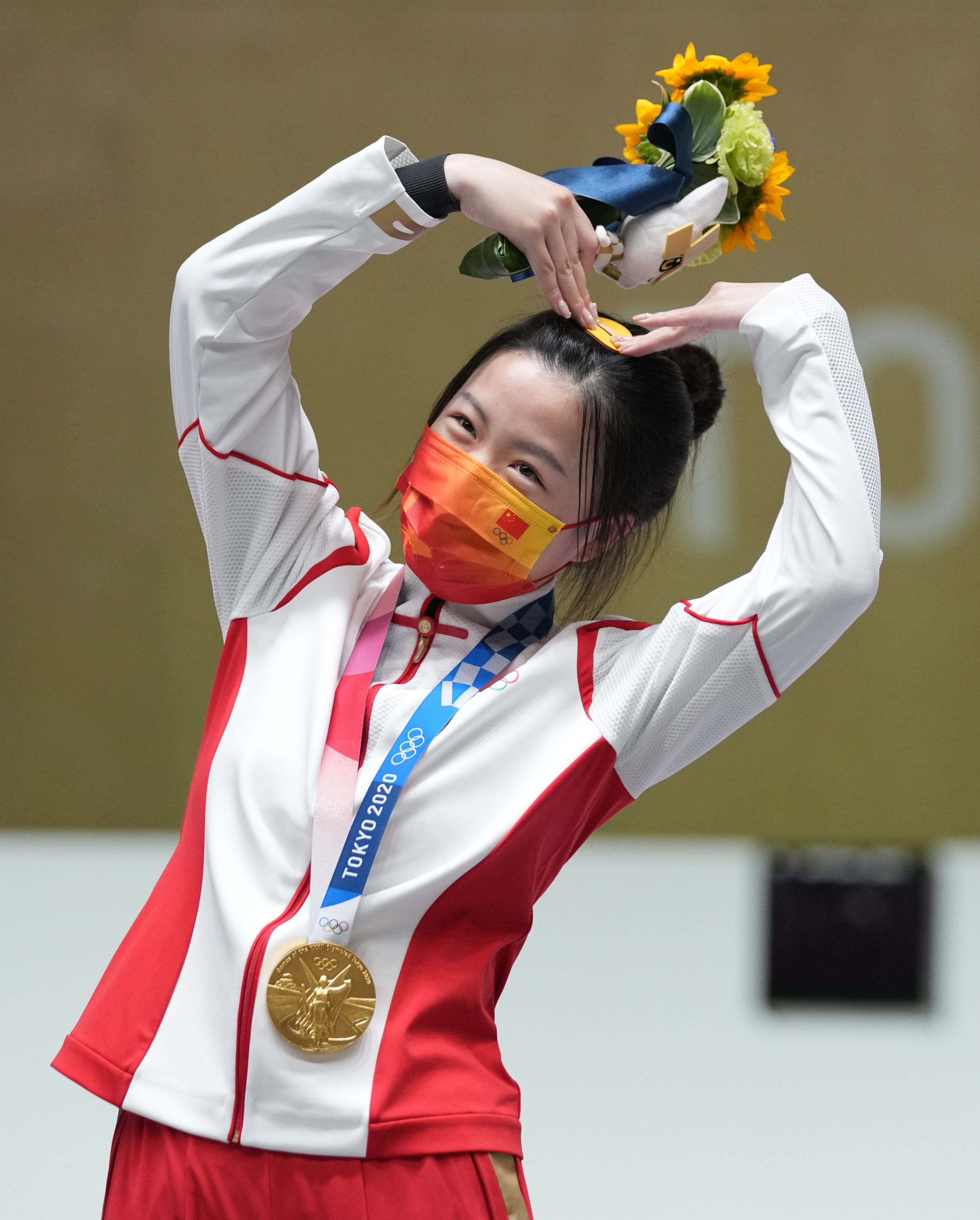 Tokyo 2020 Olympic Games women’s 10-metre air rifle shooting gold medallist Yang Qian of China in Tokyo in Japan. Photo: Xinhua   