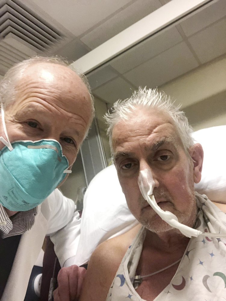 Dr Bartley Griffith takes a selfie with patient David Bennett in Baltimore, Maryland, in January 2022. Photo: University of Maryland School of Medicine via AP