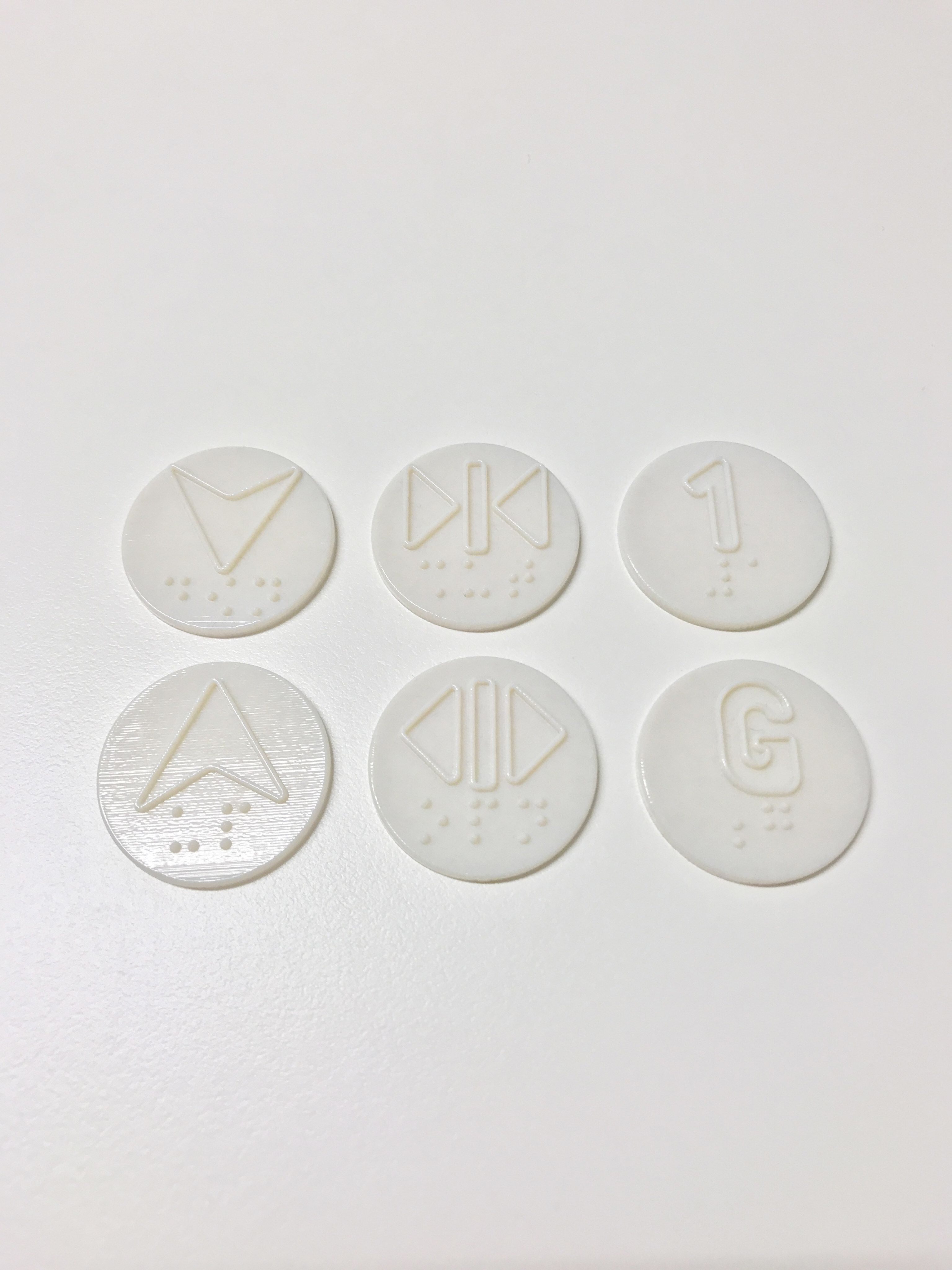 3D printed lift buttons created using the newly developed antivirus material from Hong Kong Polytechnic University. Photo: Handout