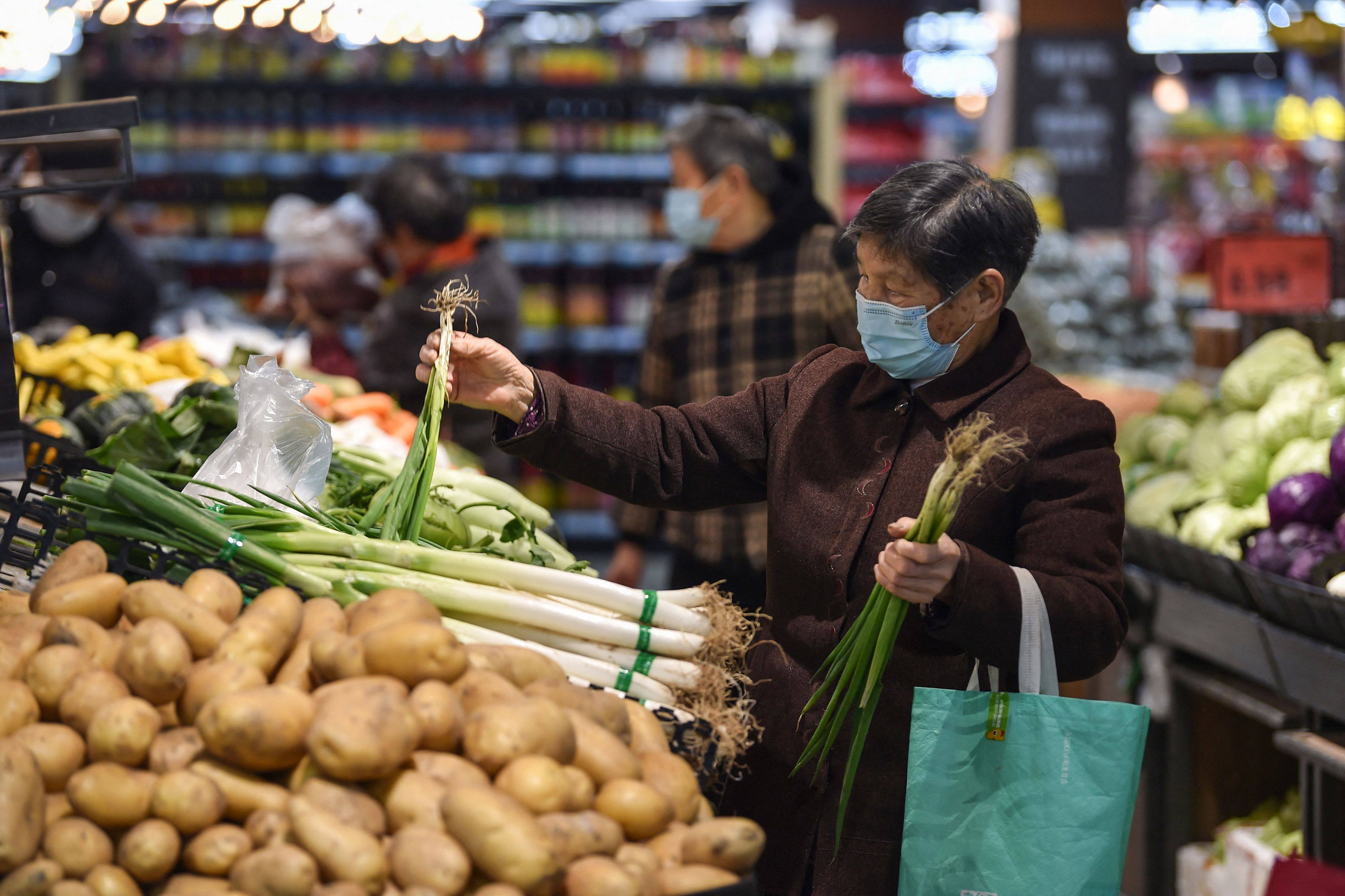 A customer shops at a supermarket in Nanjing. Photo: AFP