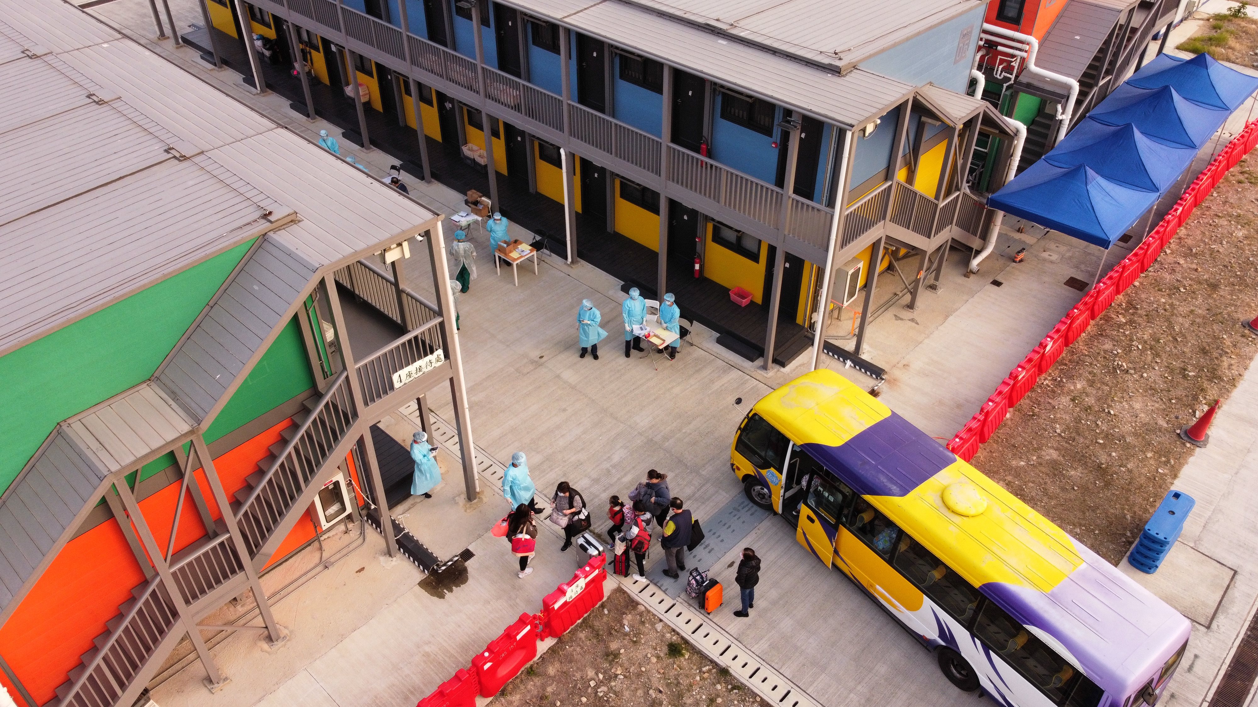 People arrive to start their stay at the Penny’s Bay Quarantine Centre on Lantau Island on January 7. Photo: Martin Chan