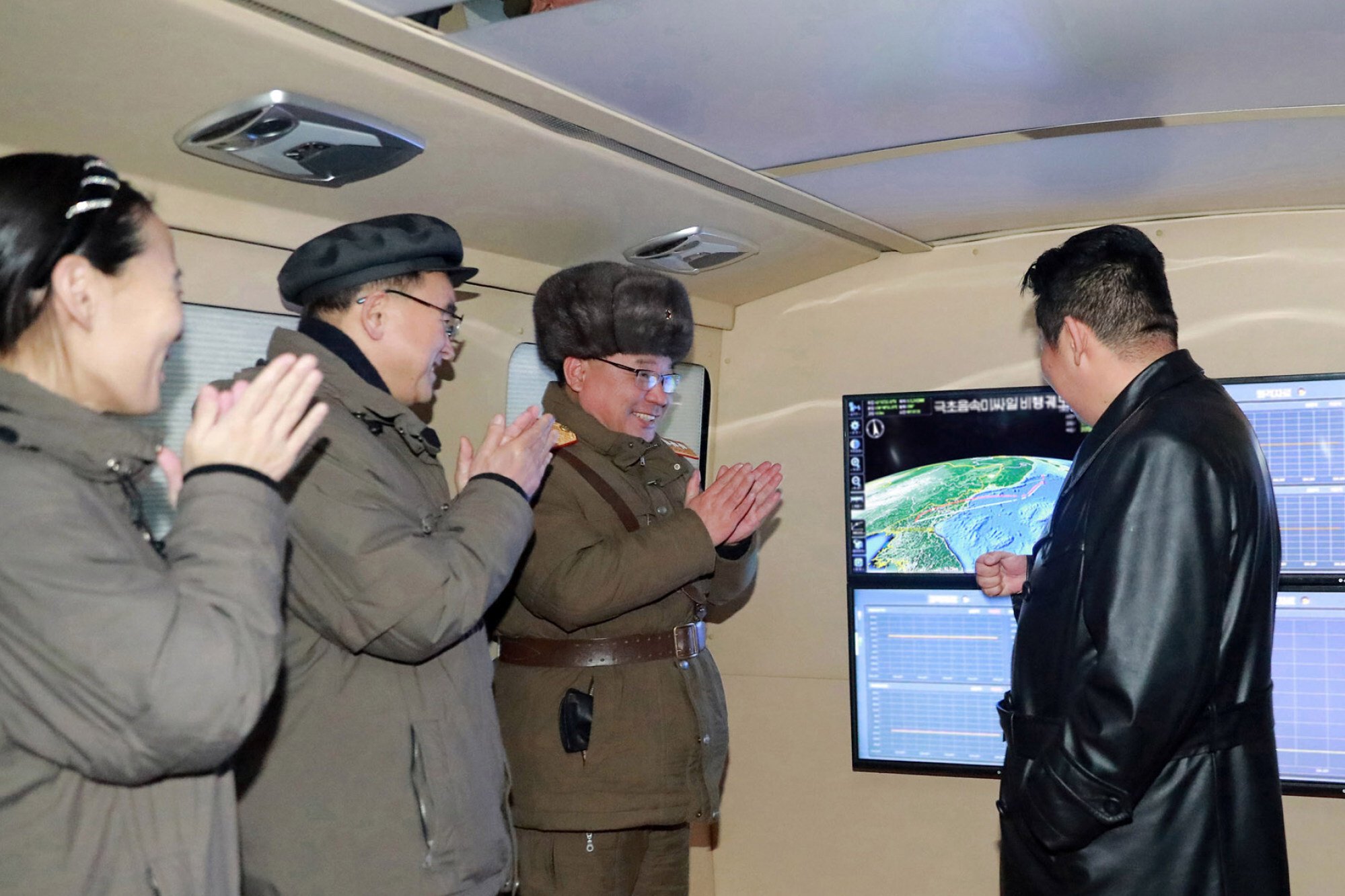 A picture provided by the North Korean Central News Agency (KCNA) shows North Korean leader Kim Jong-un (right) attending a test firing of a hypersonic missile. Photo: KCNA/dpa