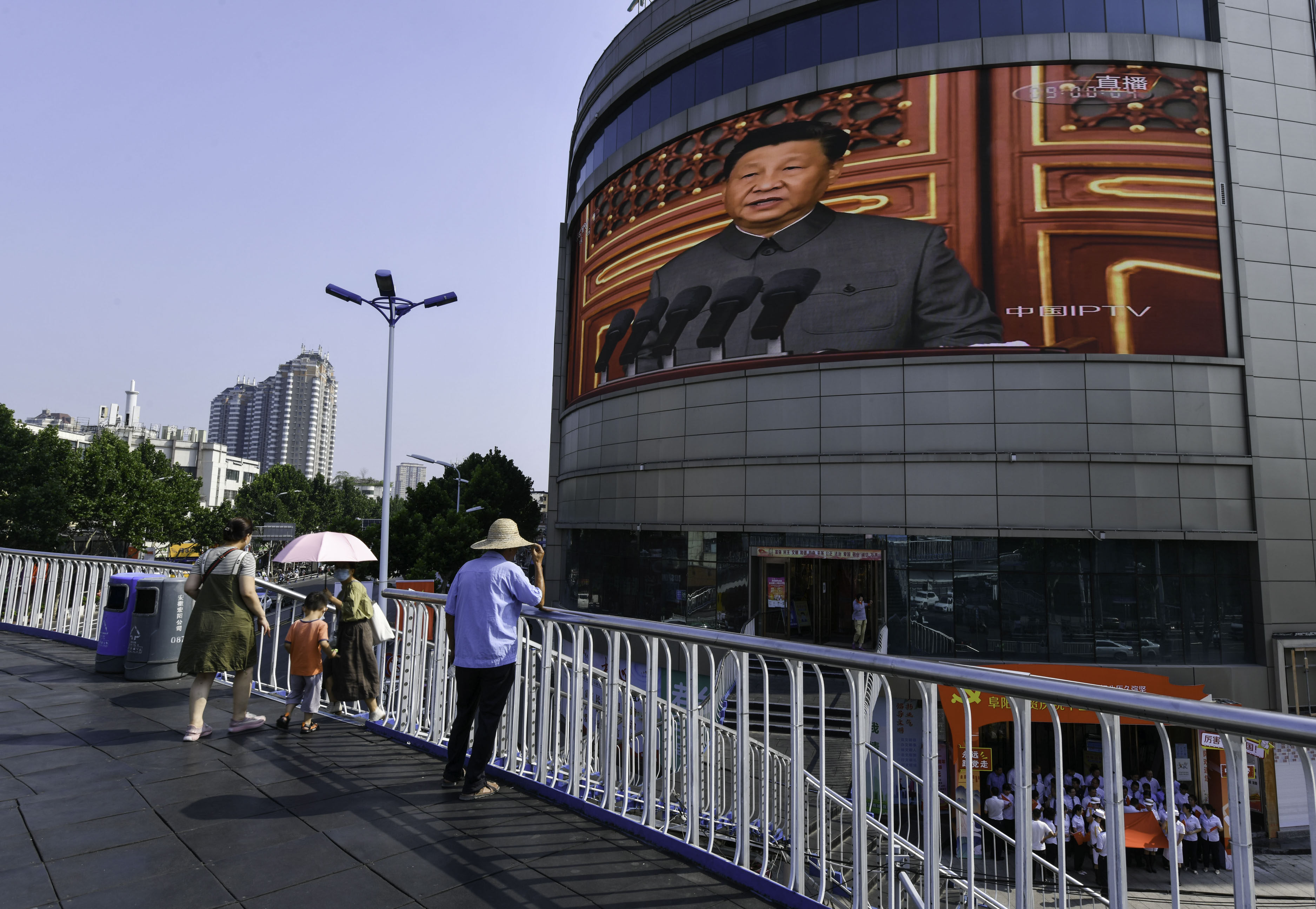 A giant screen in the Anhui provincial city of Fuyang broadcasting a speech by the Chinese President Xi Jinping on July 1, 2021 during the centenary celebrations of the ruling Communist Part of China (CPC). Photo: SOPA Images/LightRocket via Getty Images