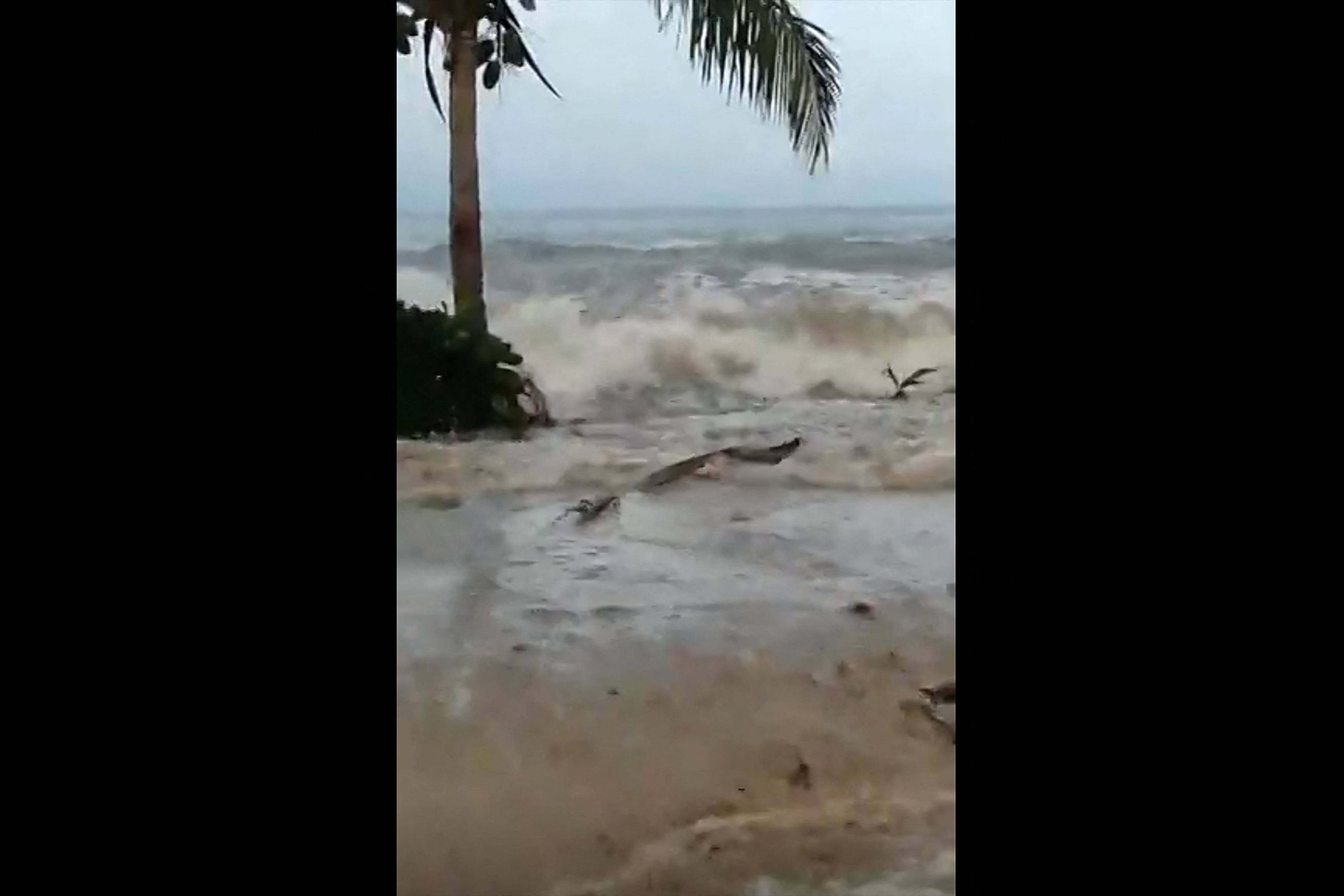 Waves hitting the beach in Suva City, Fiji, after an undersea volcanic eruption in Tonga. Photo: AFP
