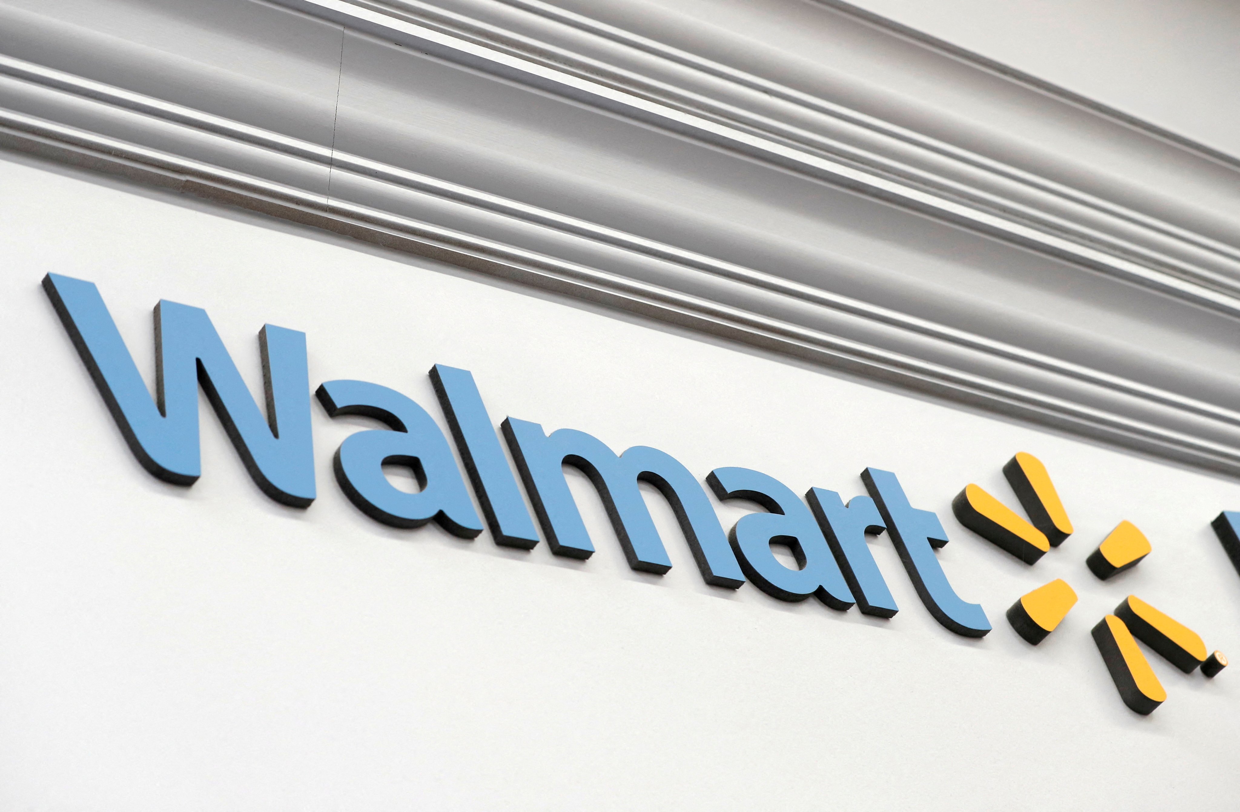A Walmart sign is seen inside its department store in West Haven, Connecticut, on February 17, 2021. Photo: Reuters