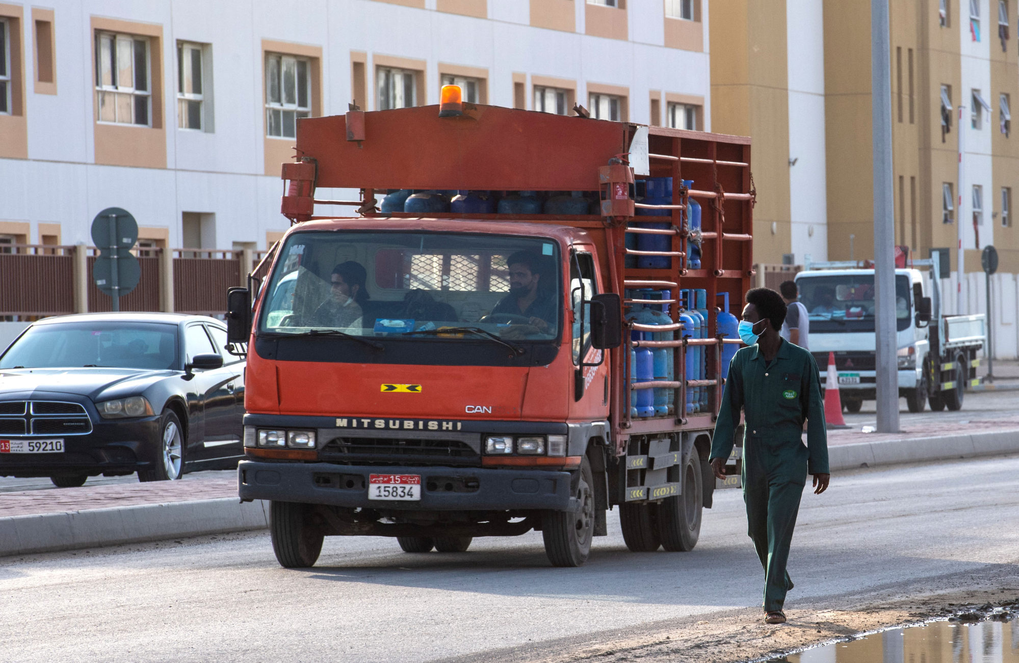 A person walks on the outskirts of the capital of the United Arab Emirates, Abu Dhabi, after a drone attack. Photo: AFP