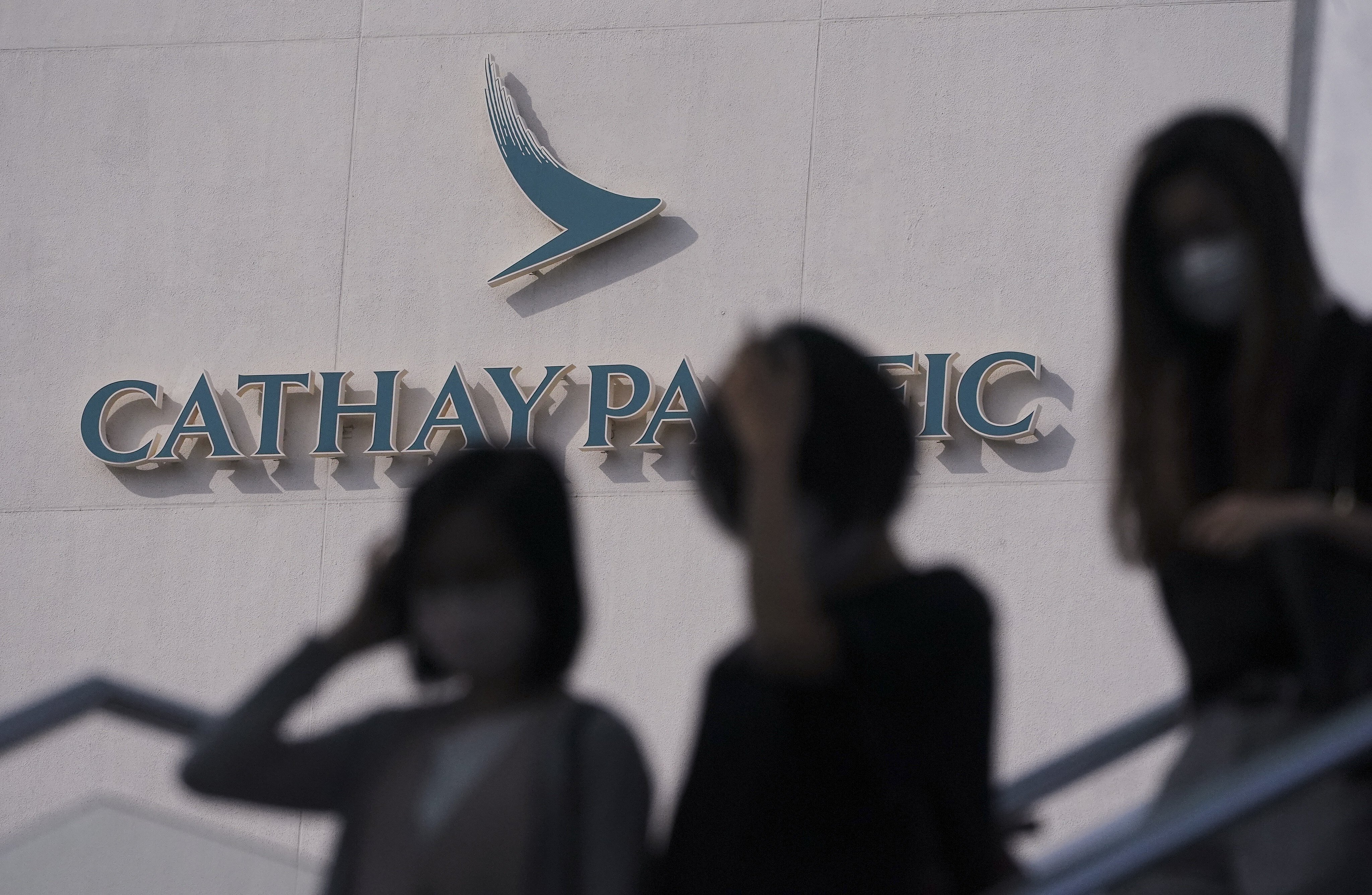 Police have arrested and charged two ex-Cathay staffers for allegedly violating the city’s anti-pandemic regulations. Photo: Felix Wong