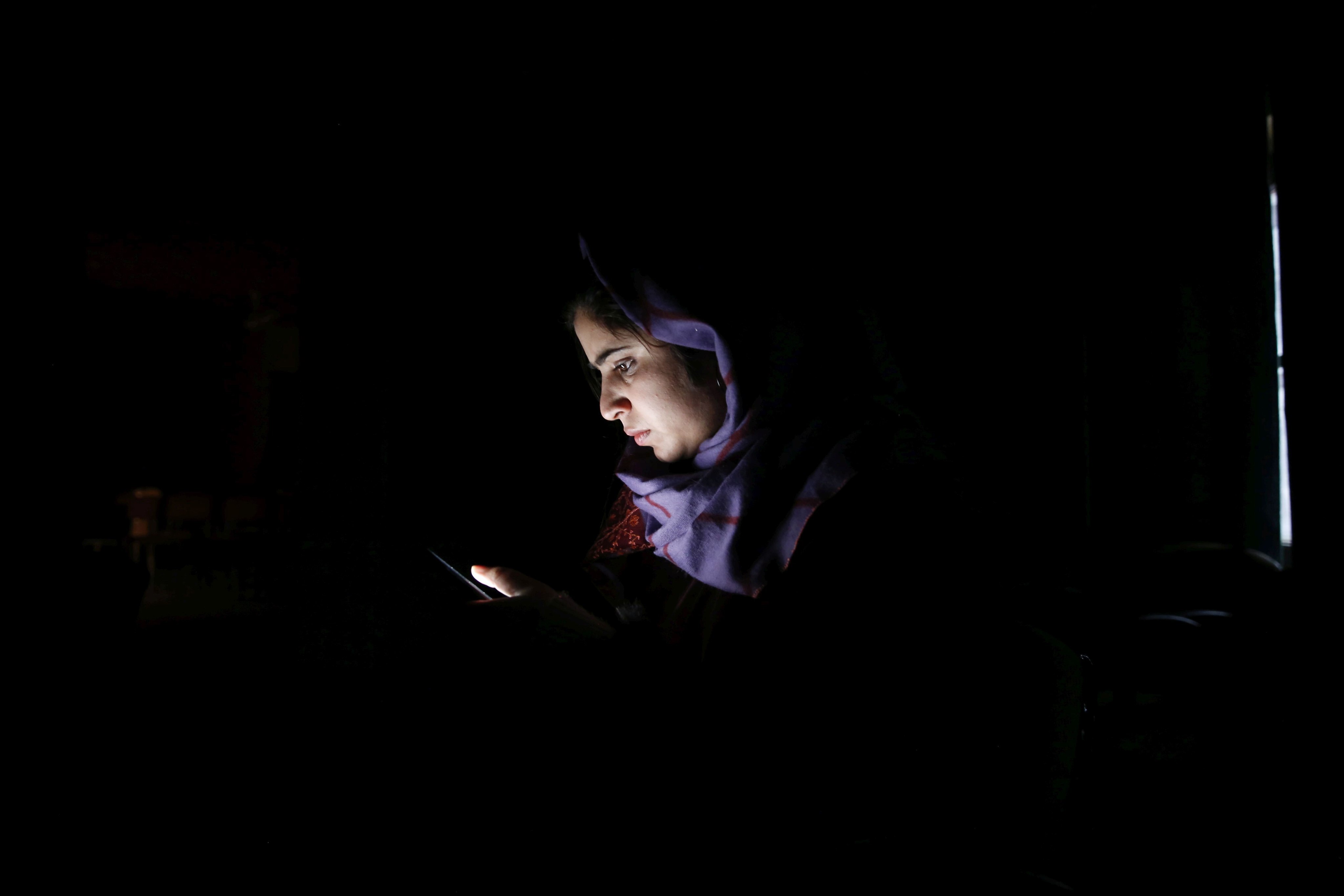 Quratulain Rehbar, a 27 year old Kashmiri photojournalist, was among the Muslim women whose names and photos were listed on the ‘Bully Bai’ application. The app also purported to offer high-profile figures like Pakistani Nobel laureate Malala Yousafzai and Indian actress Shabana Azmi “for sale”. Photo: EPA-EFE