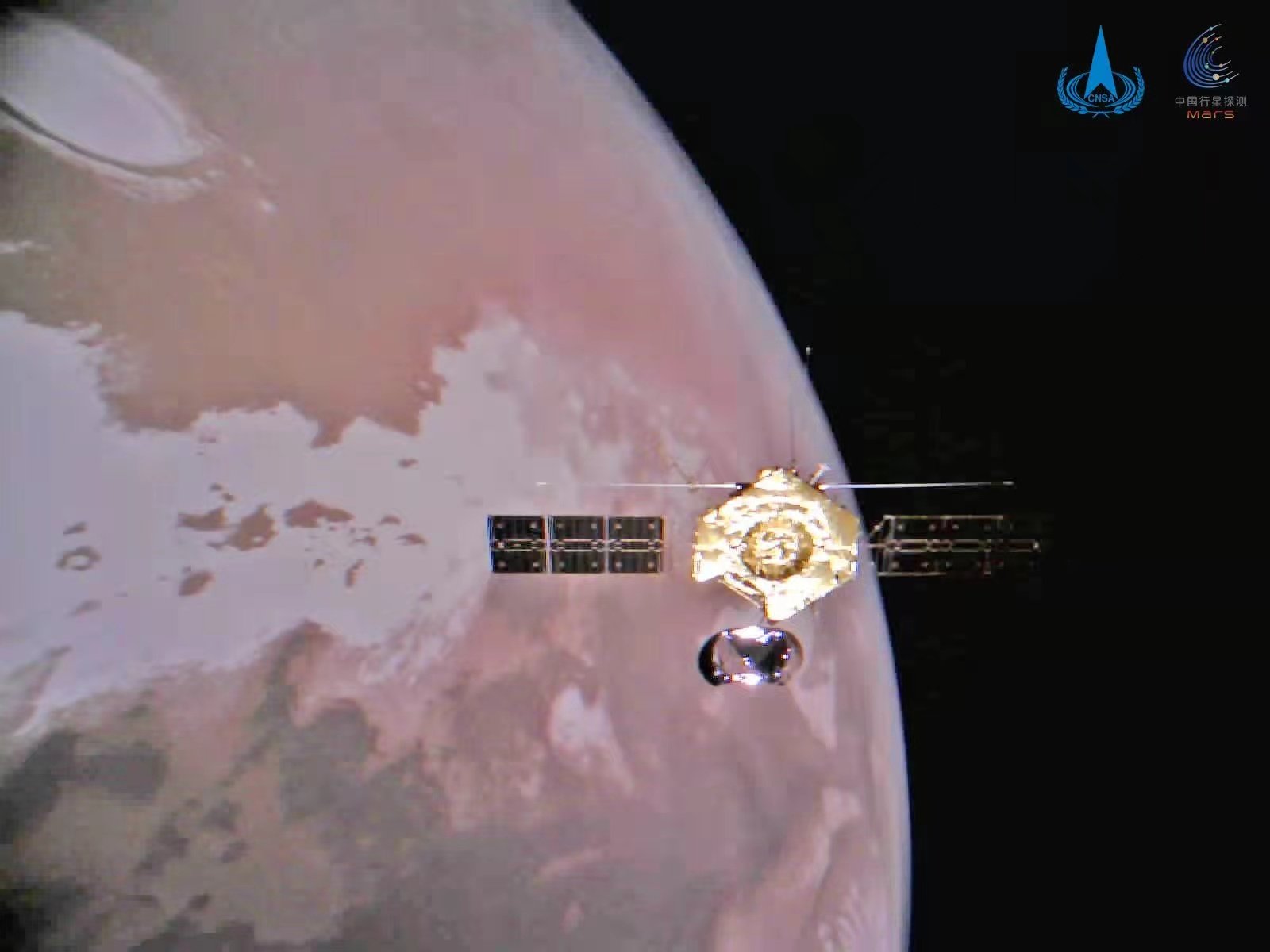 China’s Mars orbiter Tianwen-1 is seen circling above the north polar region of the Red Planet on January 1, 2022. Photo: Xinhua