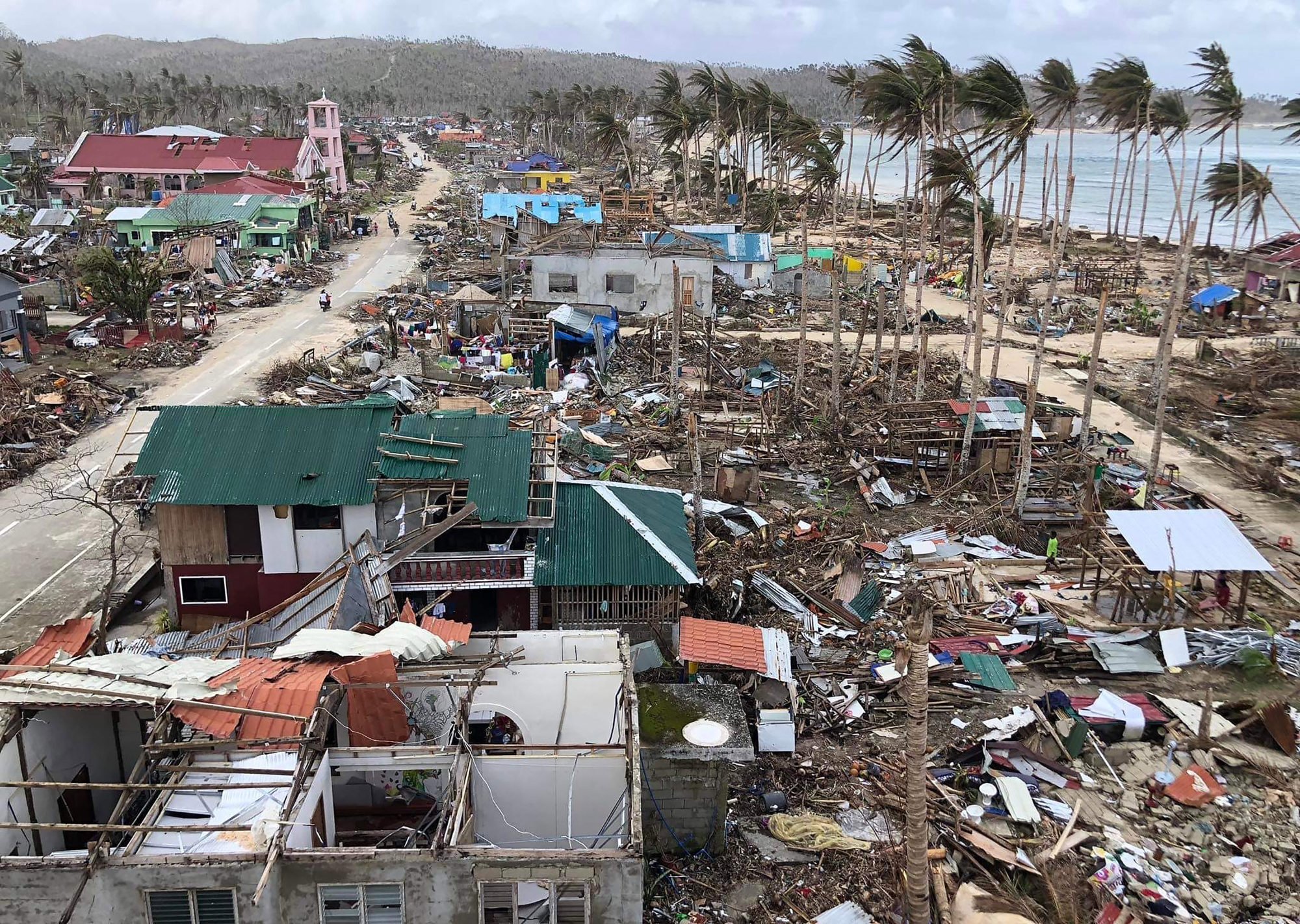 Philippine storm victims feared tsunami, ran toward mudslide