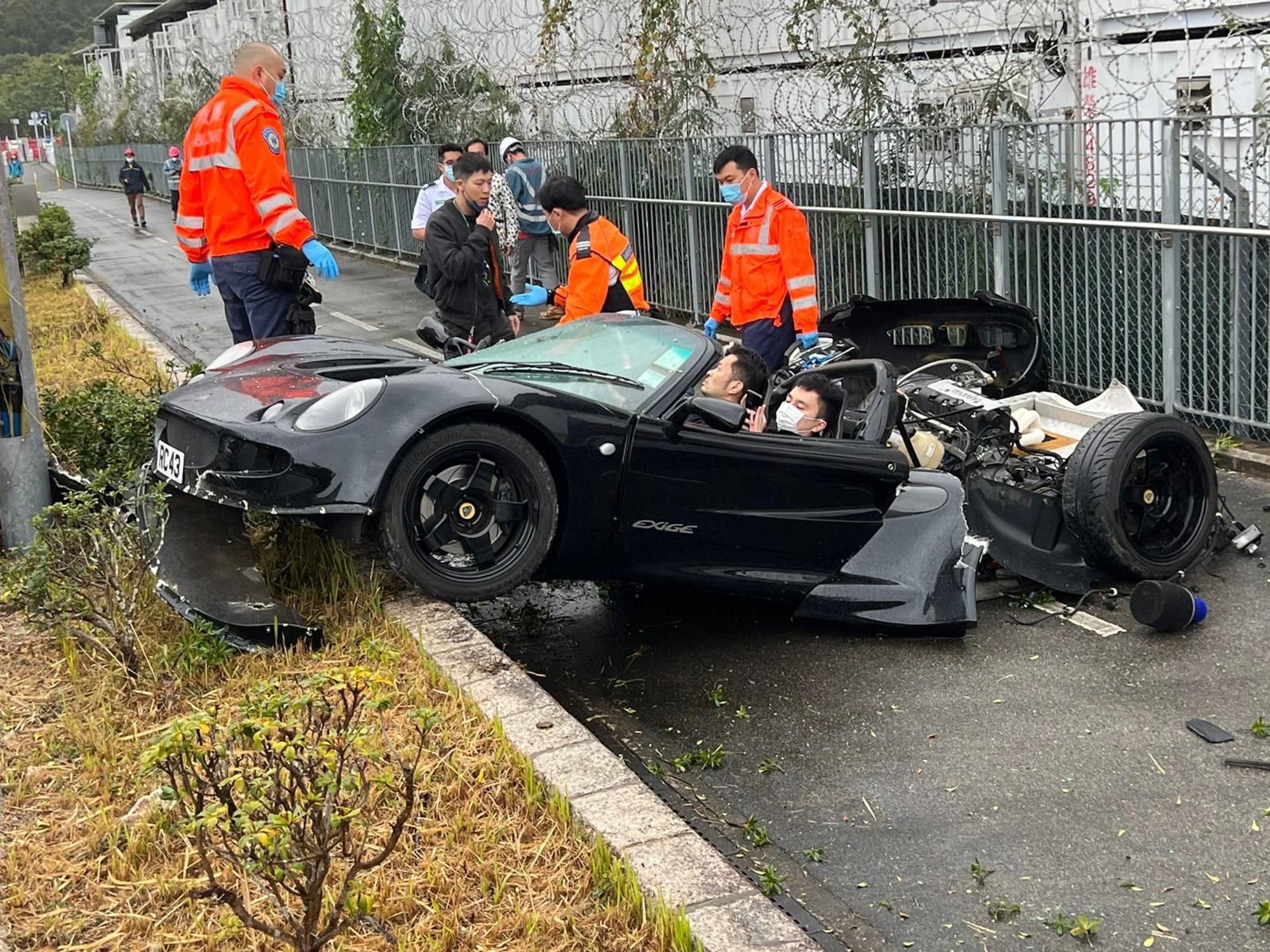 Hong Kong driver and passenger narrowly avoid death as airborne Black Lotus  Exige slams into lamp post and splits nearly in half | South China Morning  Post