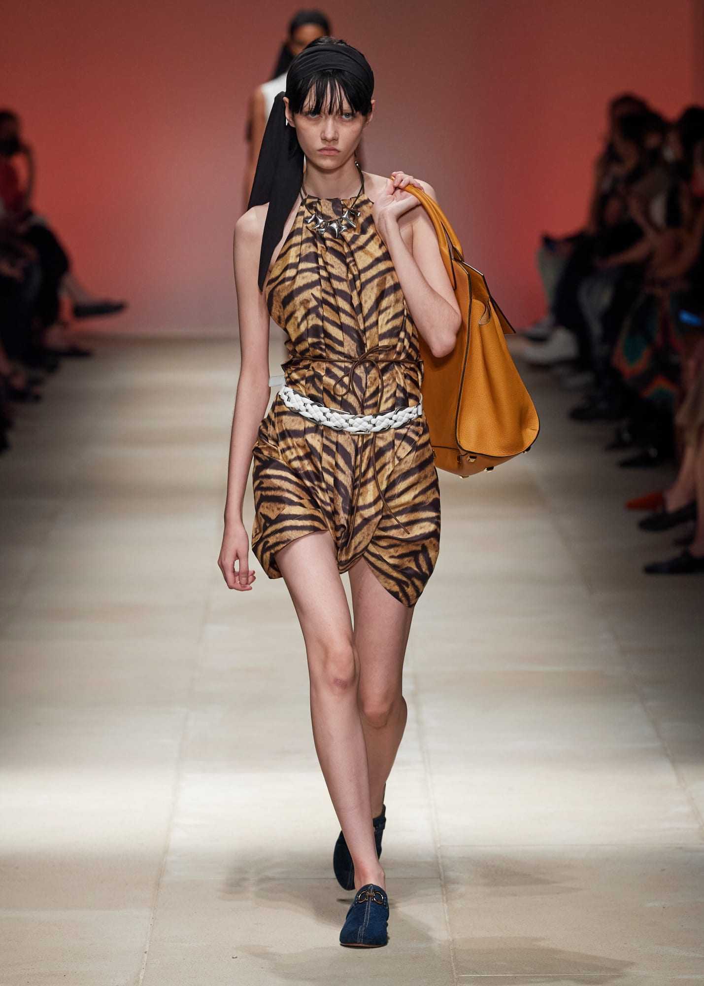 A tiger stripe look from Salvatore Ferragamo’s spring/summer 2022 collection. The luxury brand is one of many to embrace animal prints this year.