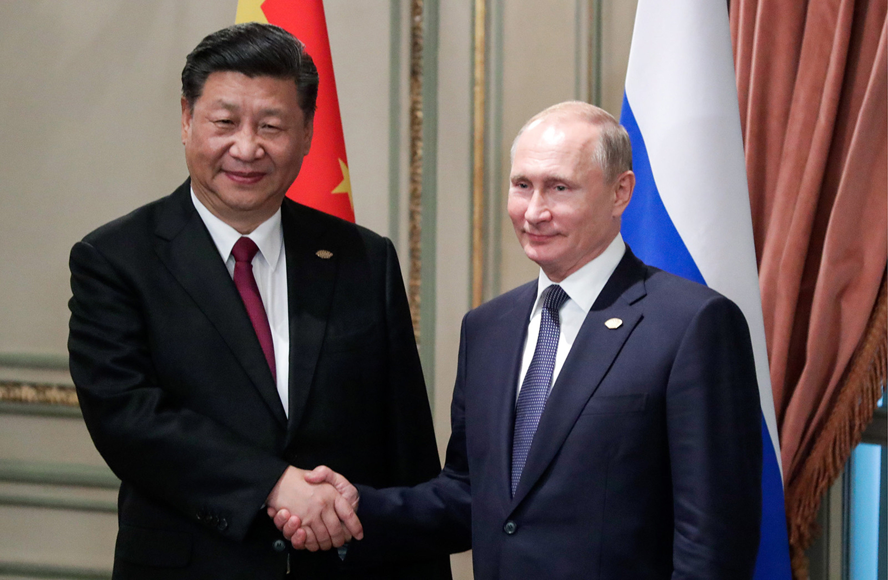 During a phone call last month, Russian President Vladimir Putin, right, told China’s President Xi Jinping, left, he would attend the Beijing Winter Olympics Games opening ceremony on February 4. But China says a report suggesting Xi asked Putin to refrain from invading Ukraine during the Games attempts to undermine the Olympics. Photo: Tass