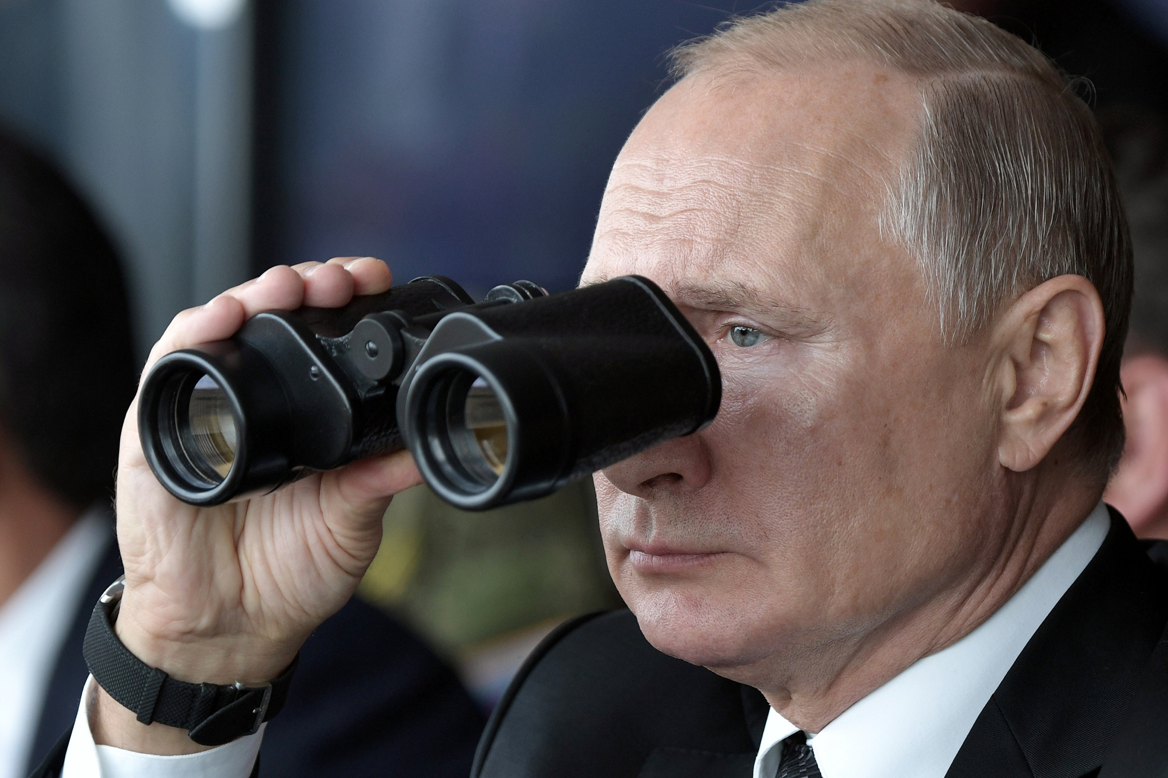 Russian President Vladimir Putin watches through a pair of binoculars the military exercises at Donguz shooting range near Orenburg, Russia, in September 2019. Not very much can be done without concentrations of power, but the fact is power can be used for evil as well as for good. Photo: AP 
