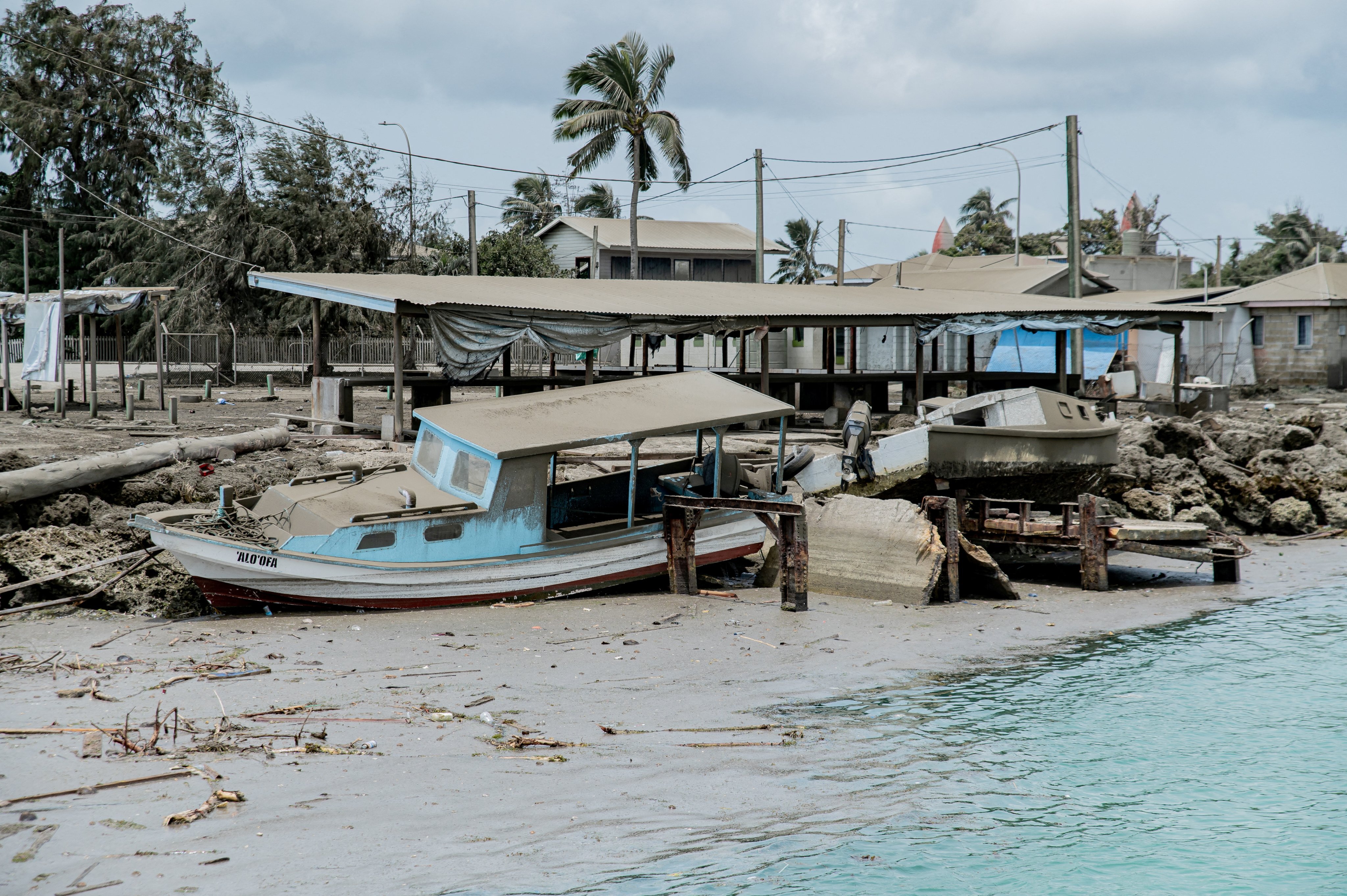 Damaged buildings are seen following the volcanic eruption and tsunami in Tongatapu, Tonga. Photo: Malau Media via Reuters