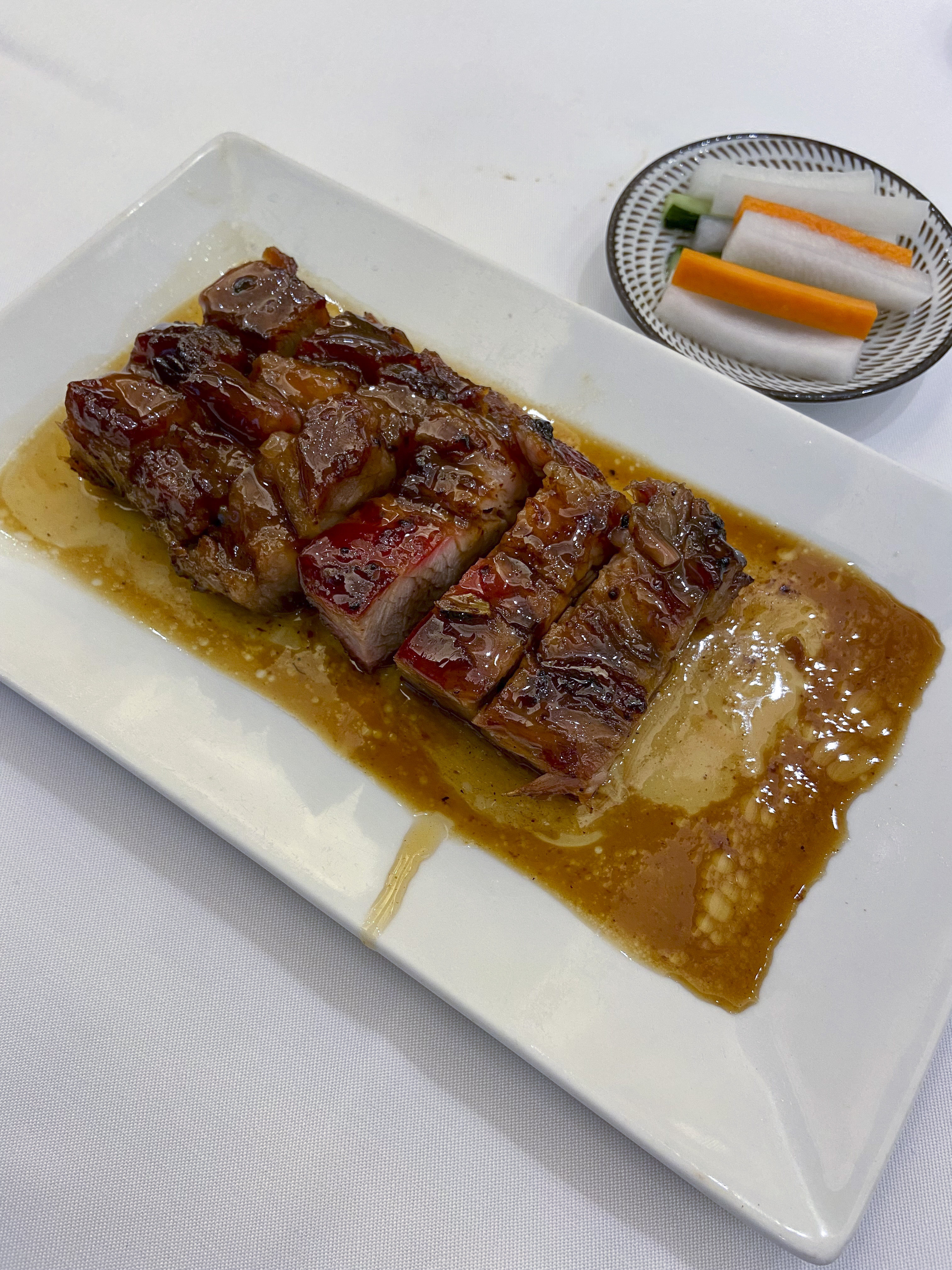 Master Woo’s honey-glazed barbecue pork. Photo: Susan Jung