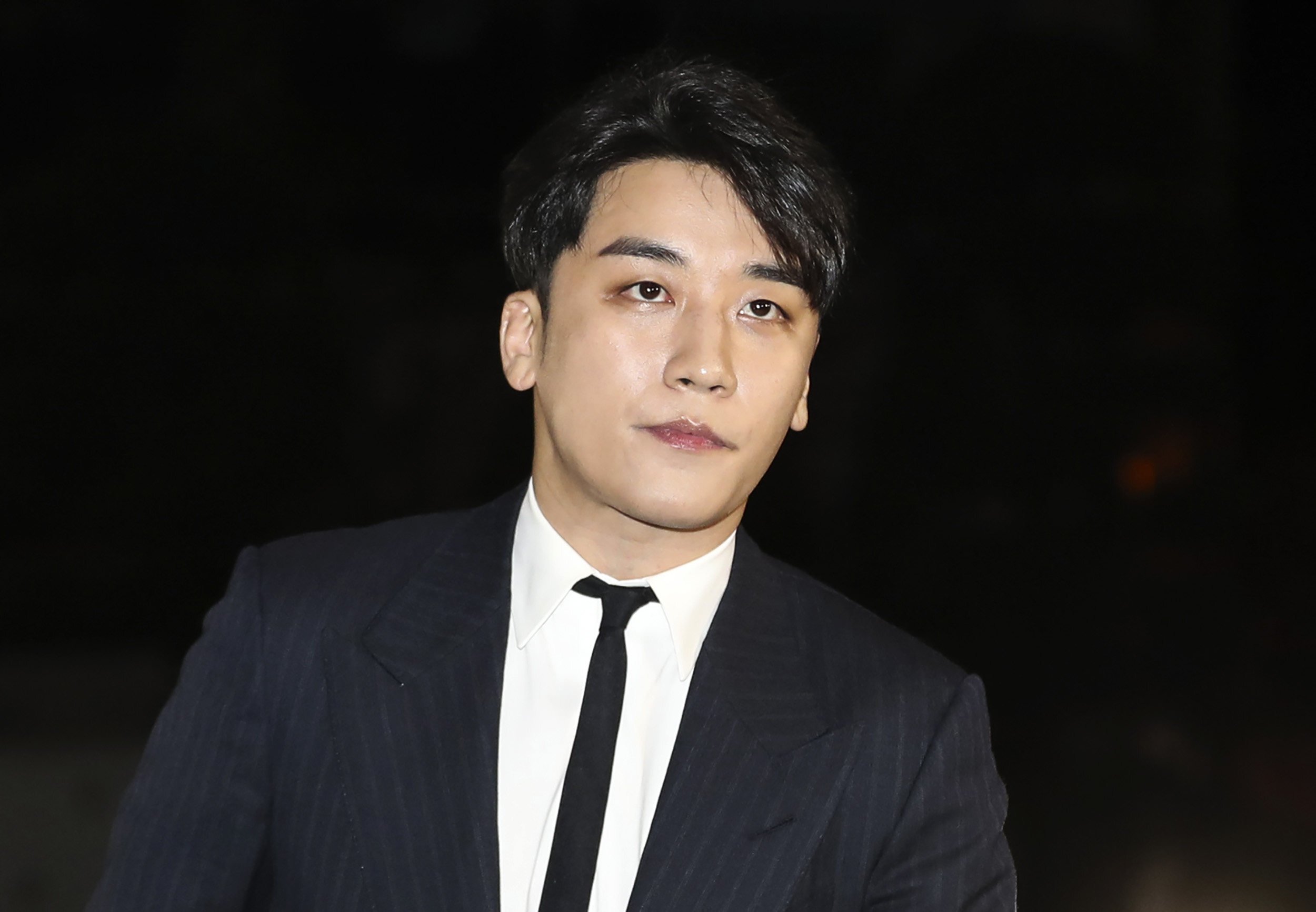 Seungri, a former member of popular K-pop boy group Big Bang, has acknowledged his responsibility for crimes to which he had previously pleaded not guilty, and received a reduced jail term, at an appeal court hearing in South Korea. Photo: Yonhap/AFP
