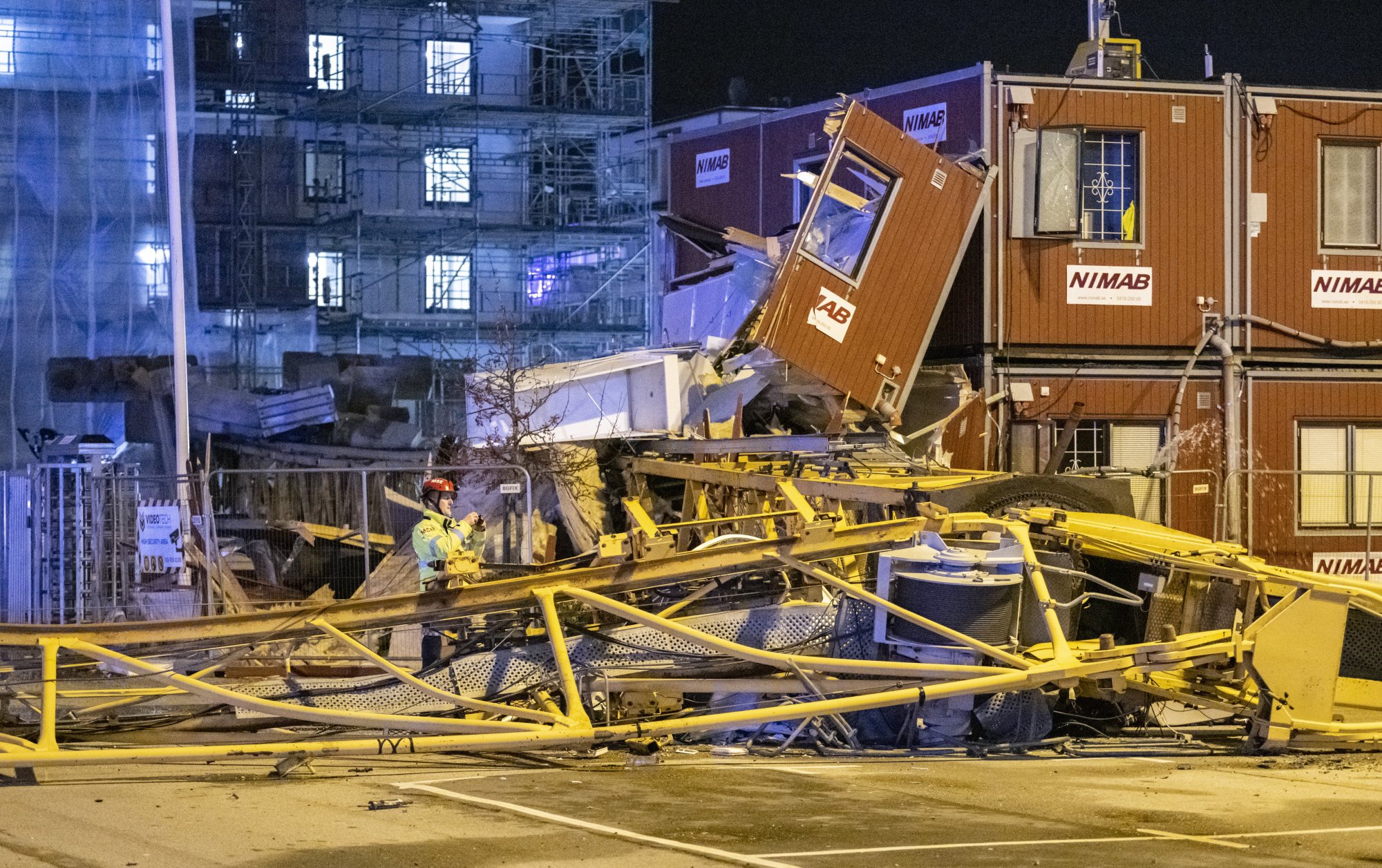 A construction crane, overturned as a result of Storm Malik, in Malmo, Sweden, on January 31. Photo: TT via AP