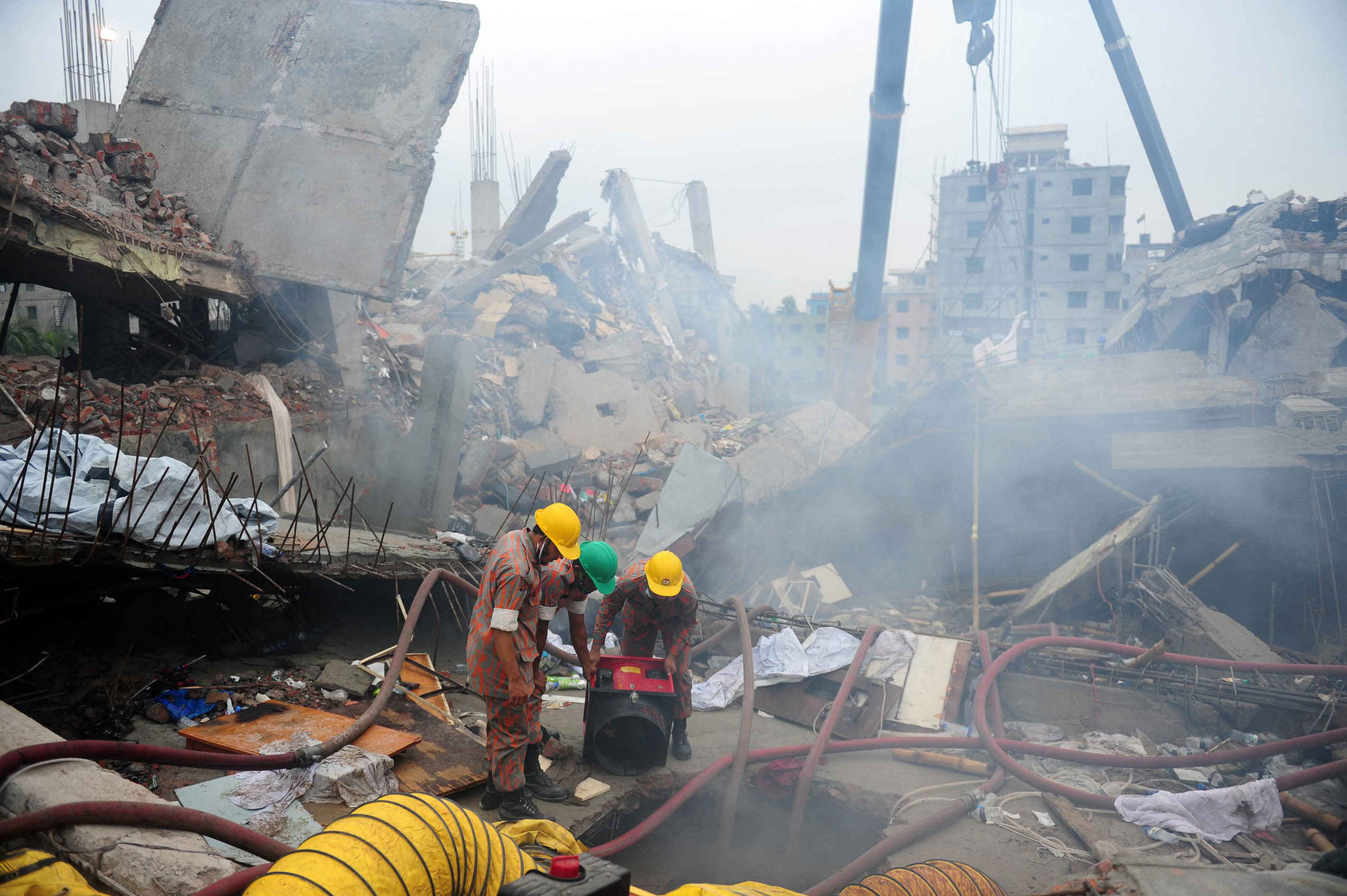 Bangladeshi firefighters at the collapsed Rana Plaza building in 2013. Photo: AFP