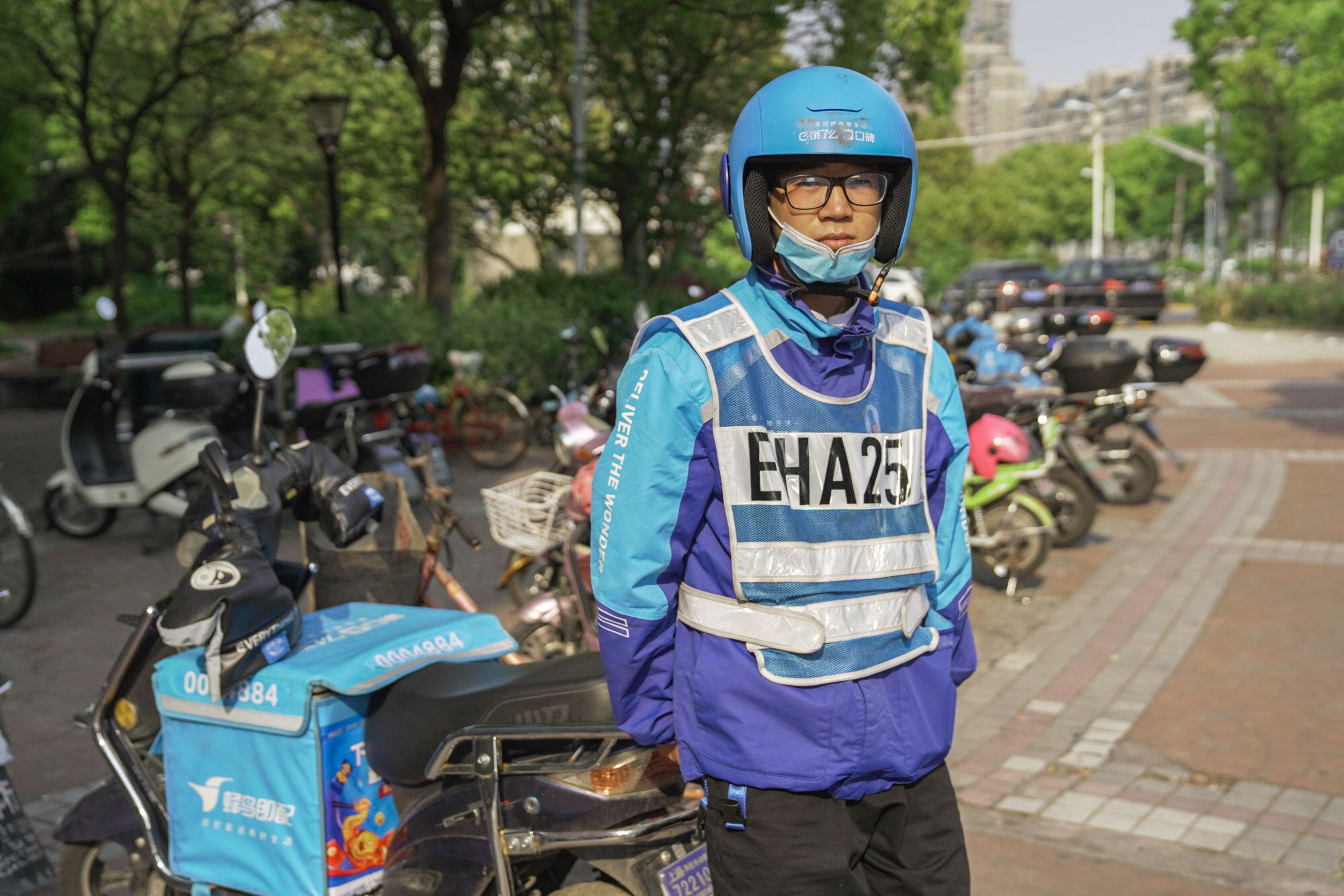 An Ele.me delivery driver waits for his next order. Photo: SCMP/Thomas Yau