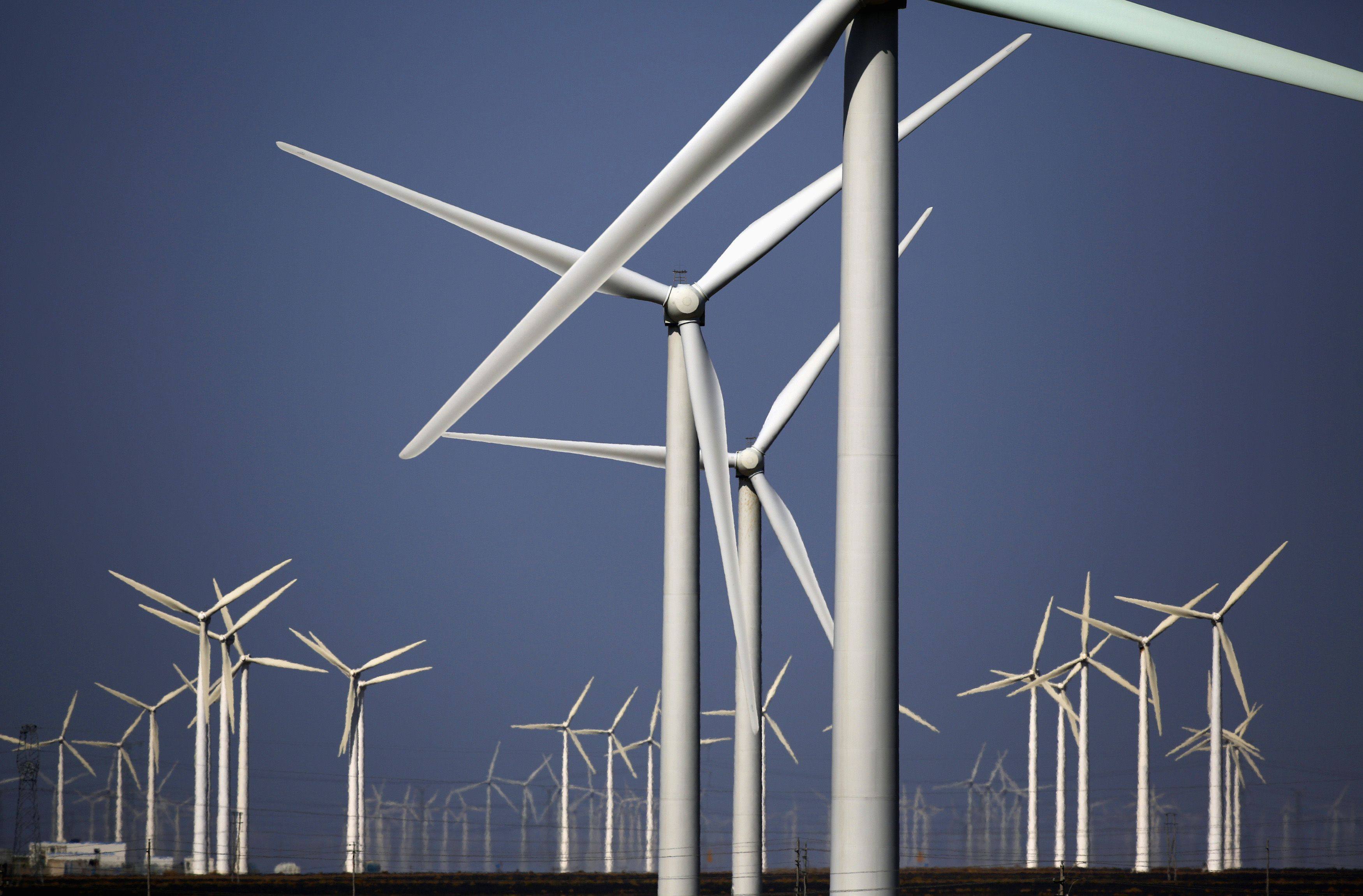 Wind turbines in China’s Gansu province. Transition bonds issuance globally nearly tripled in each of the past two years, but lags behind green bonds, sustainability bonds and sustainability-linked bonds. Photo: Reuters