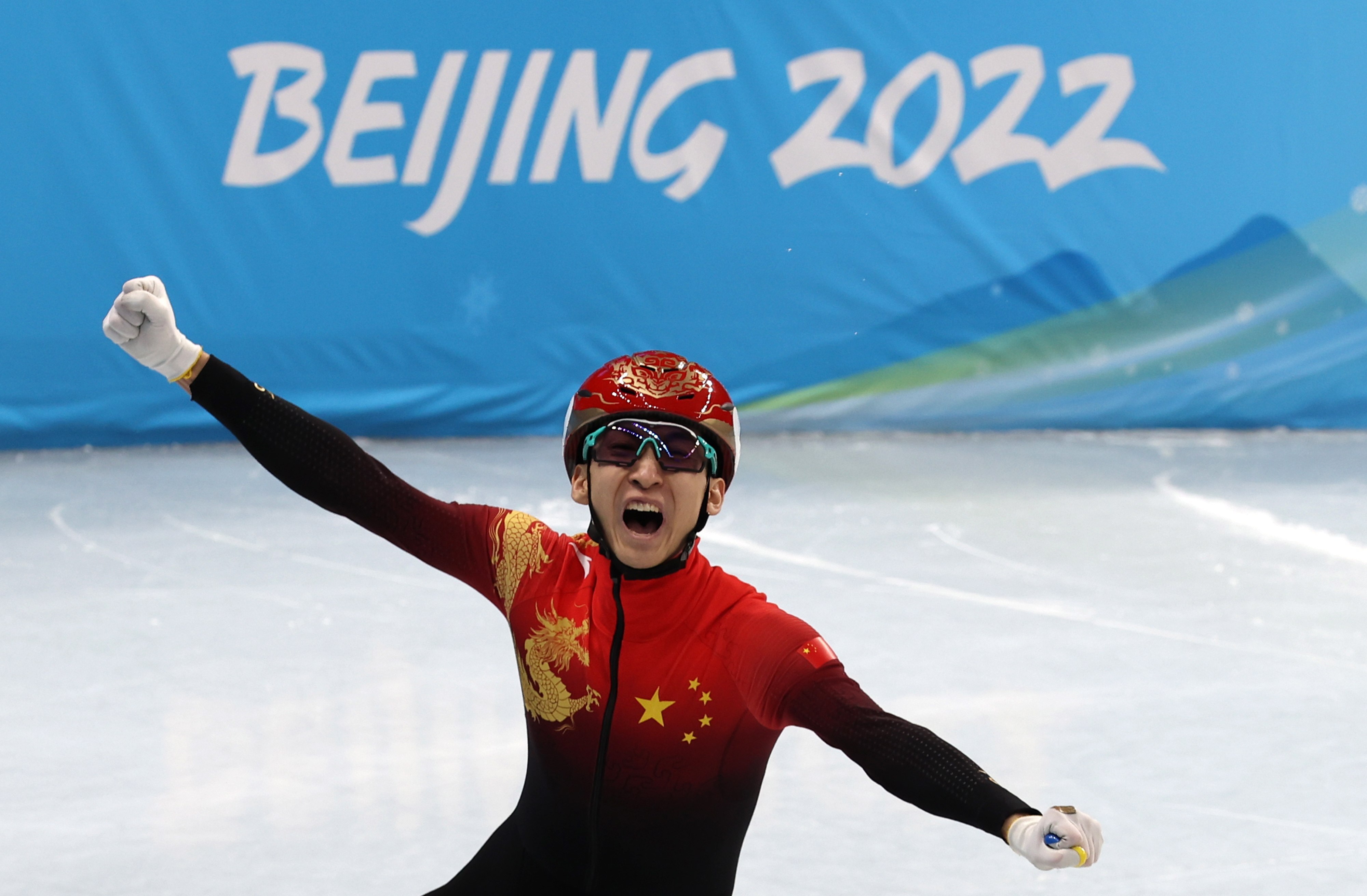 Dajing Wu celebrates winning the mixed team relay final. Photo: EPA-EFE