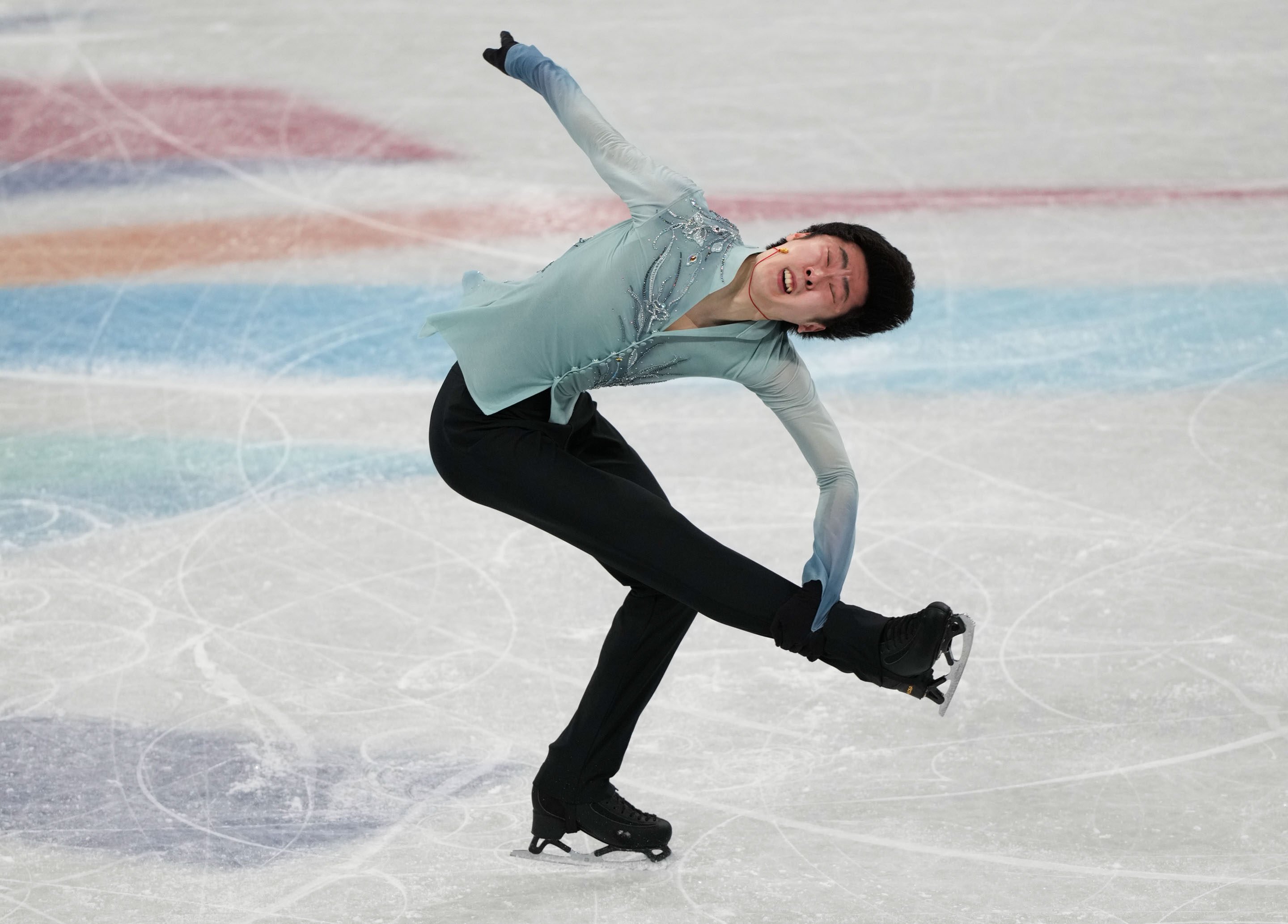 China’s Jin Boyang performs during the men’s singles short programme at the Capital Indoor Stadium. Photo: Xinhua