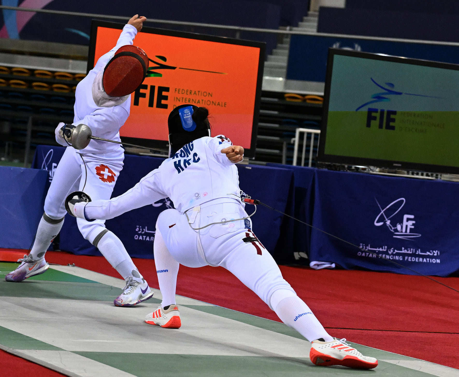 Vivian Kong (right) in action at the Doha Grand Prix. Photo: International Fencing Federation